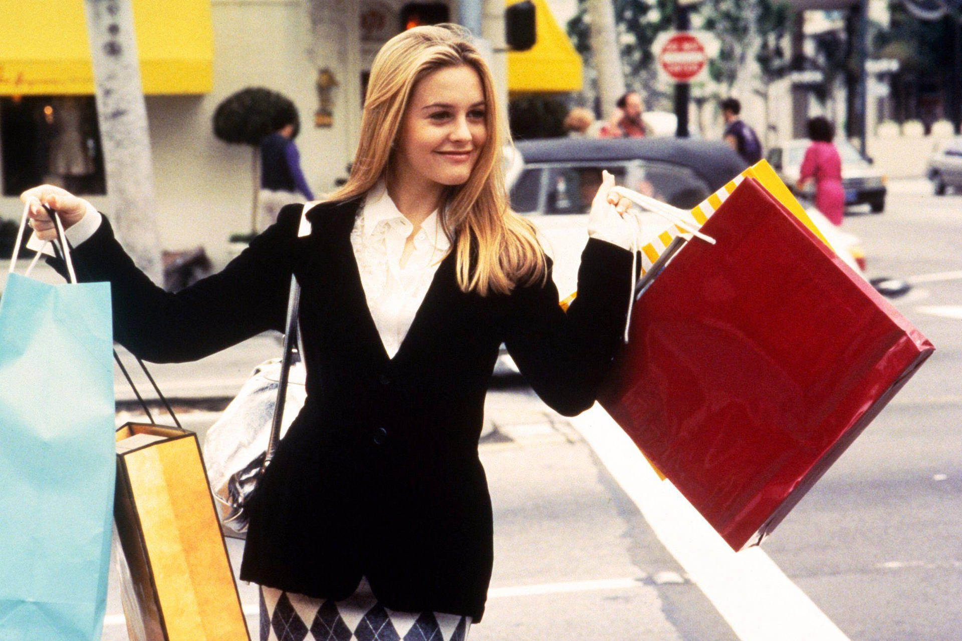 Clueless Alicia With Shopping Bags Background