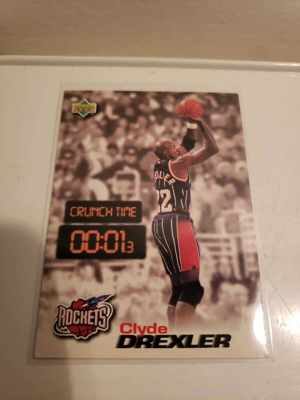 Clyde Drexler In Action While Playing For The Houston Rockets Background