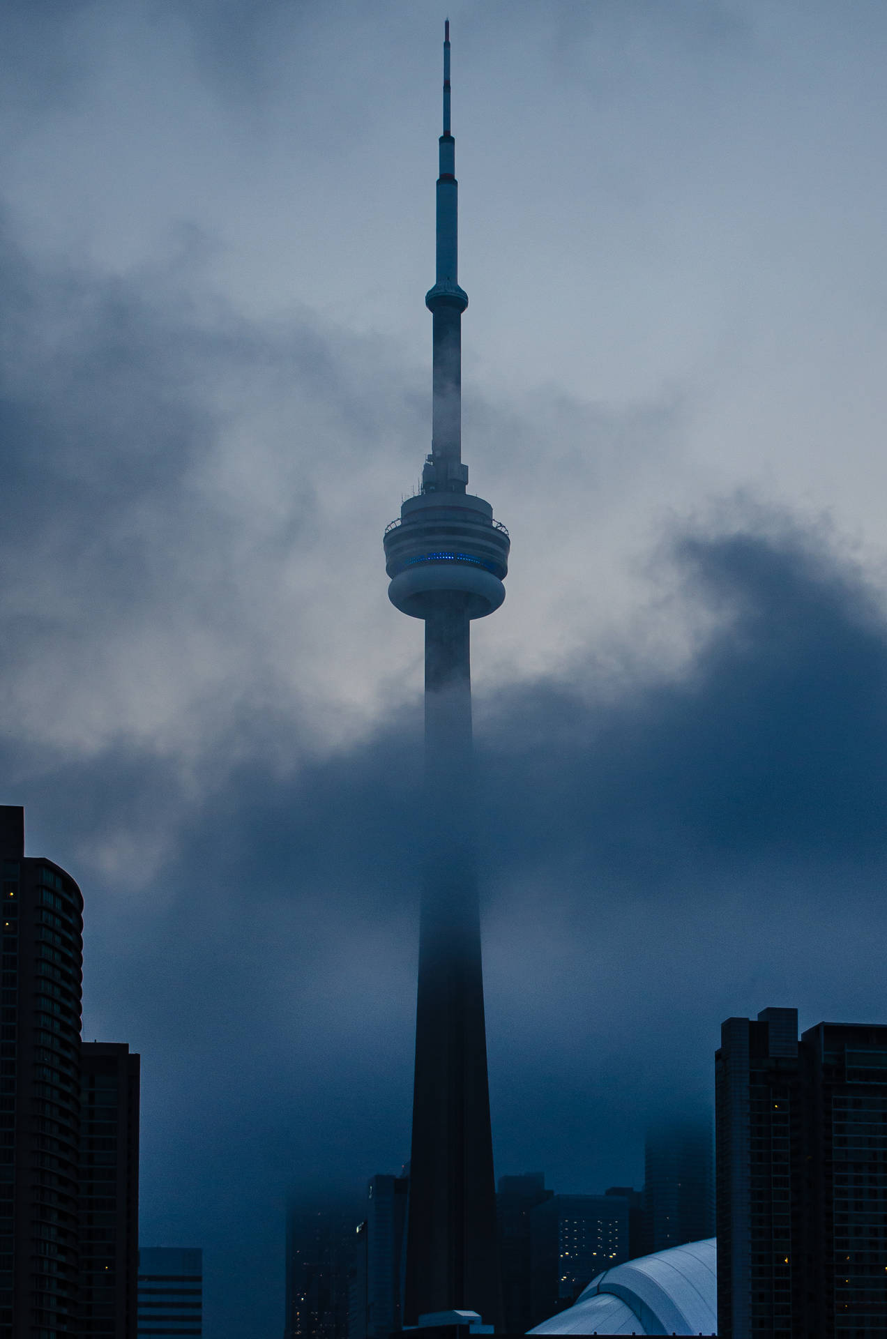 Cn Tower Covered In Clouds