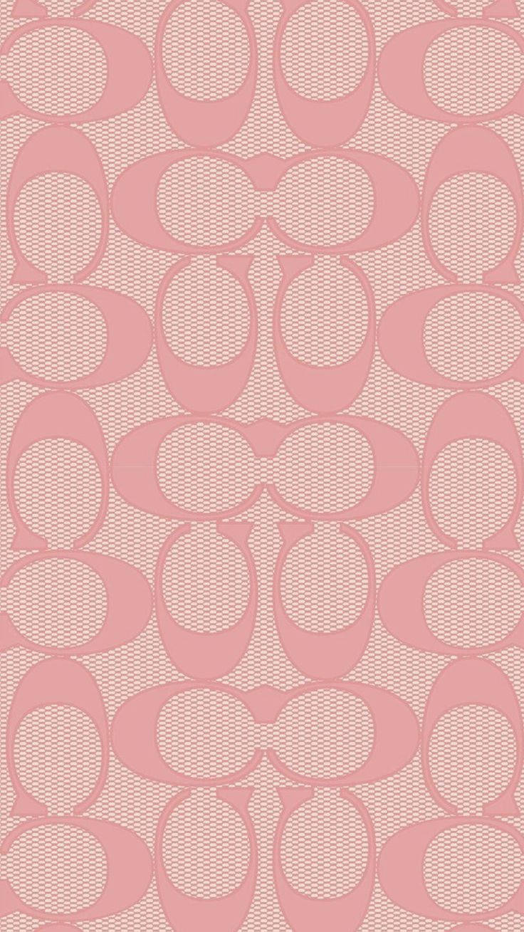 Coach Designer Logo In Pink Pattern Background