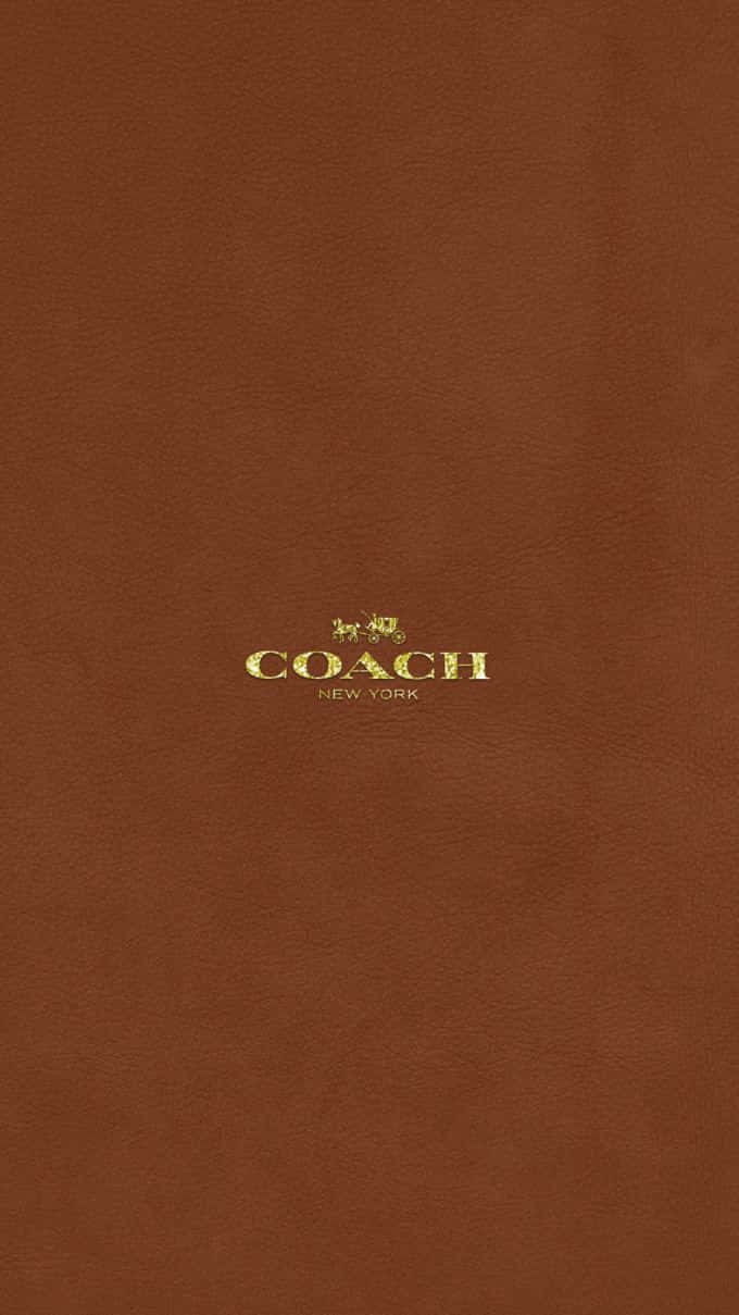 Coach Logo On A Brown Background Background