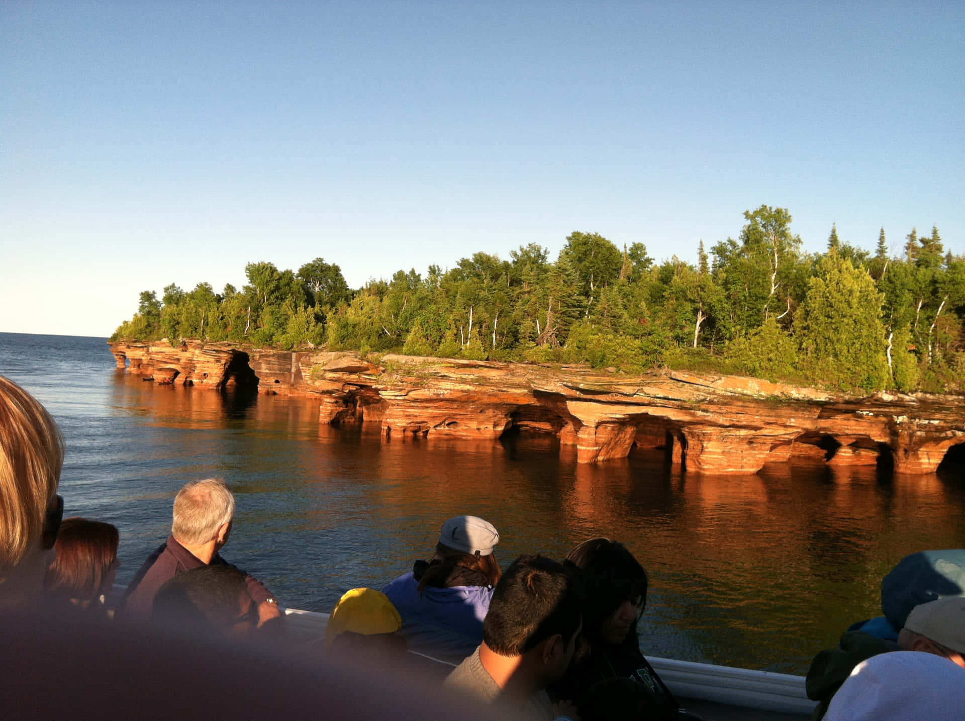 Coastal_ Cave_ View_ From_ Boat_ Tour Background