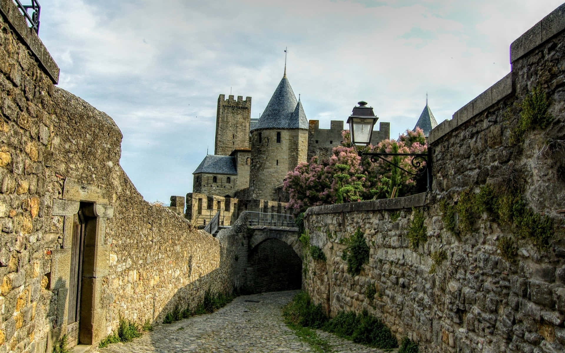 Cobblestone Street In Carcassonne France Background