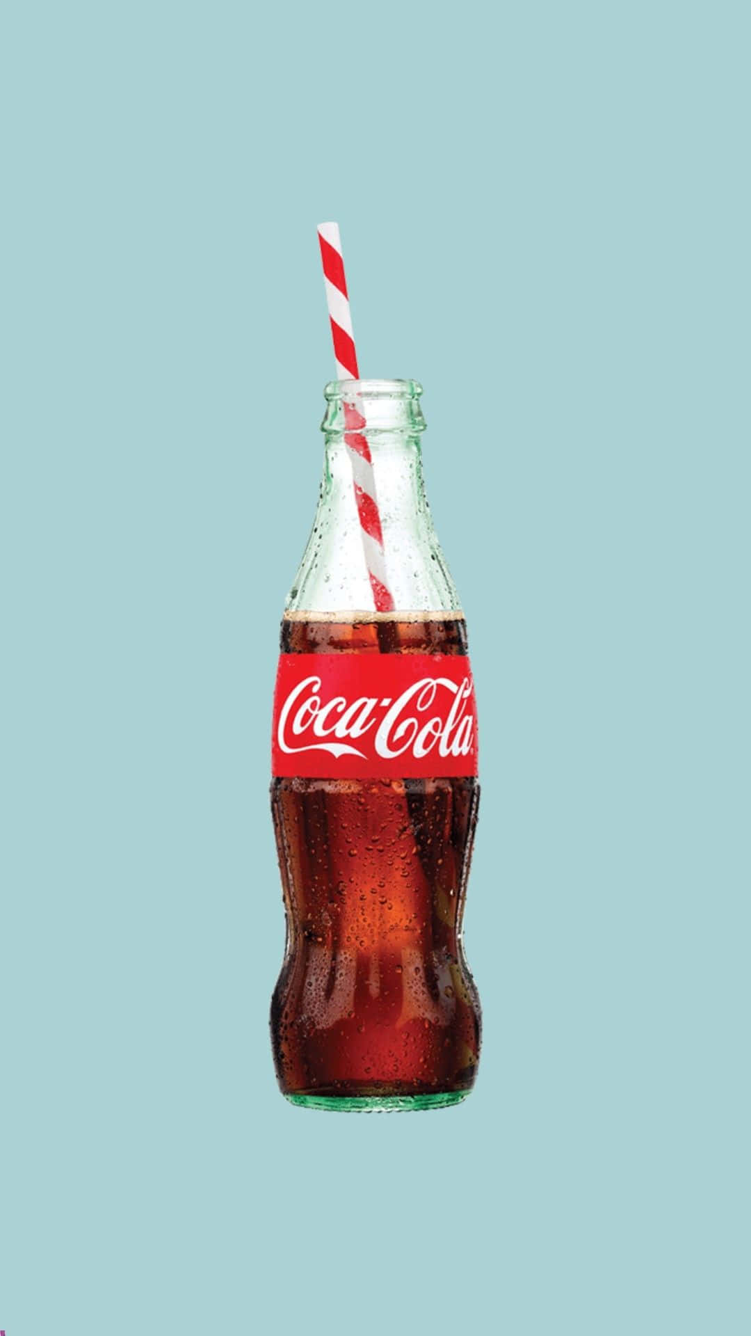 Coca Cola Bottle With A Straw On A Blue Background