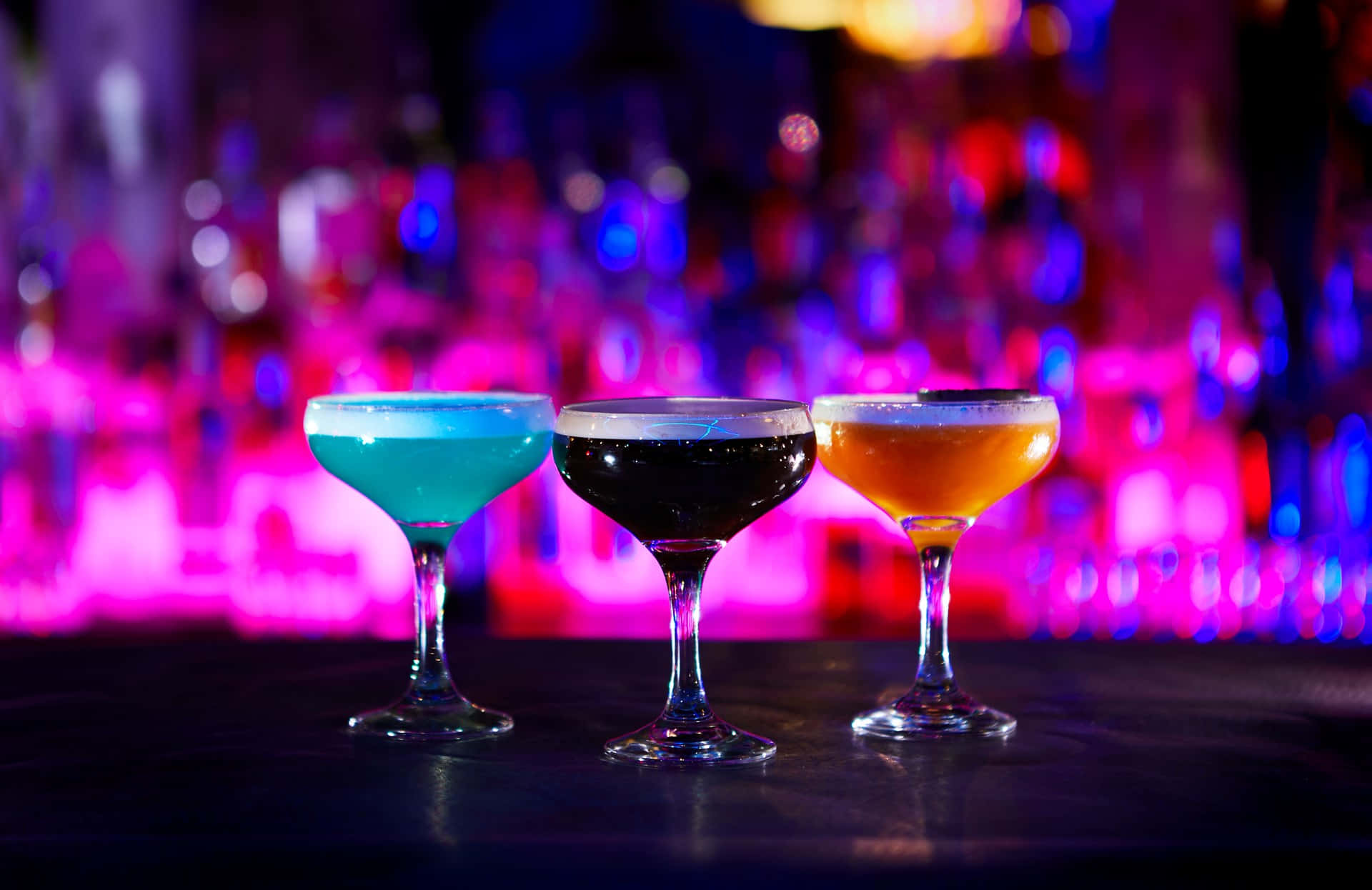 Cocktail Drinks On Purple Bar Counter Background