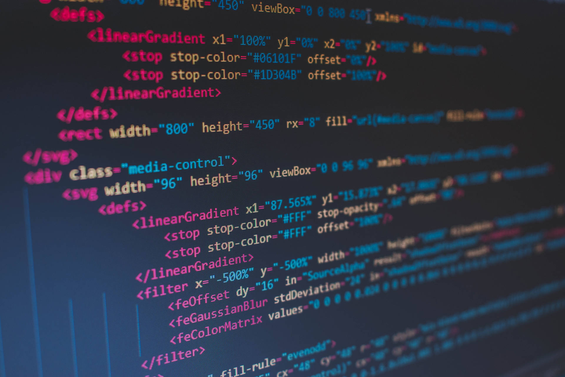 Coding On A Colorful Blur Background