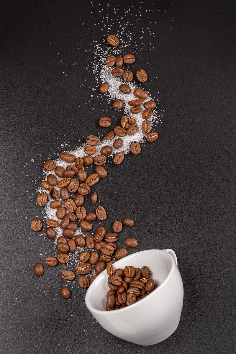 Coffee Beans And Sugar In White Bowl Background