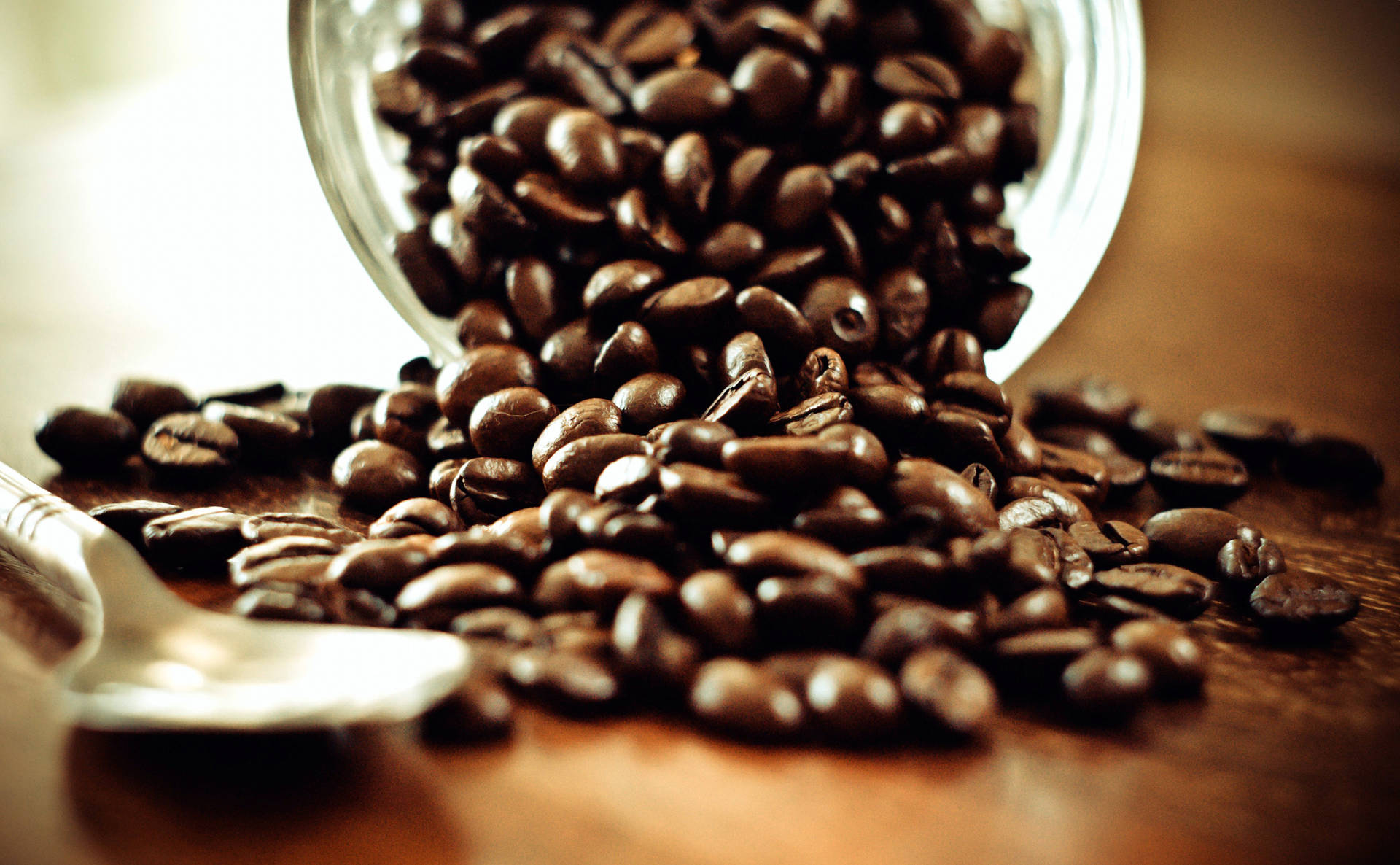 Coffee Beans Pouring Out Of Jar Background