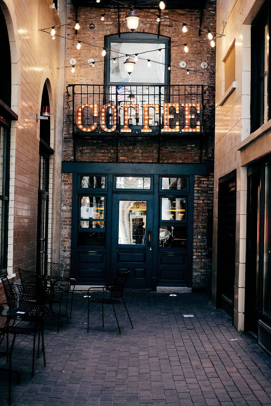 Coffee Shop With Black Doors Background