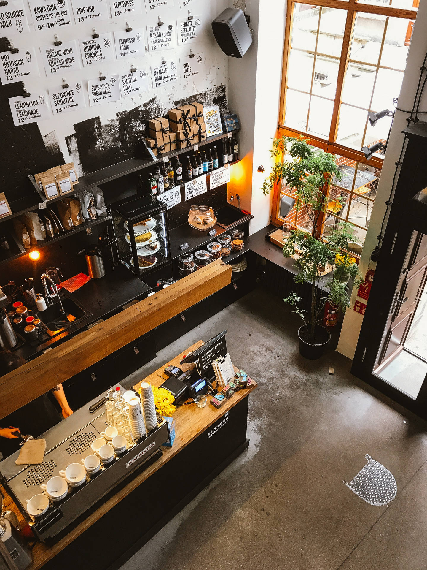 Coffee Shop With Indoor Plants Background