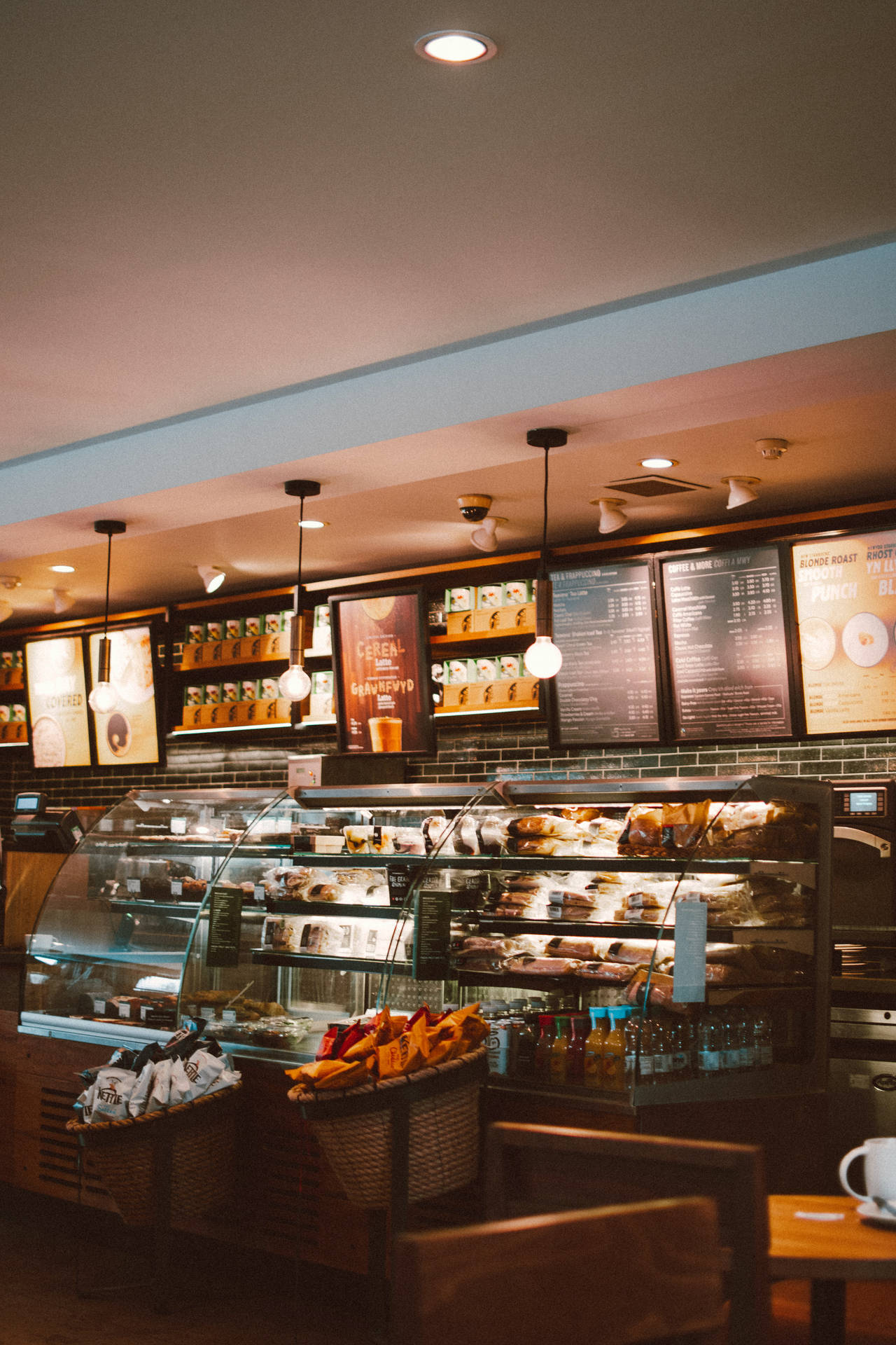 Coffee Shop With Pastries Background