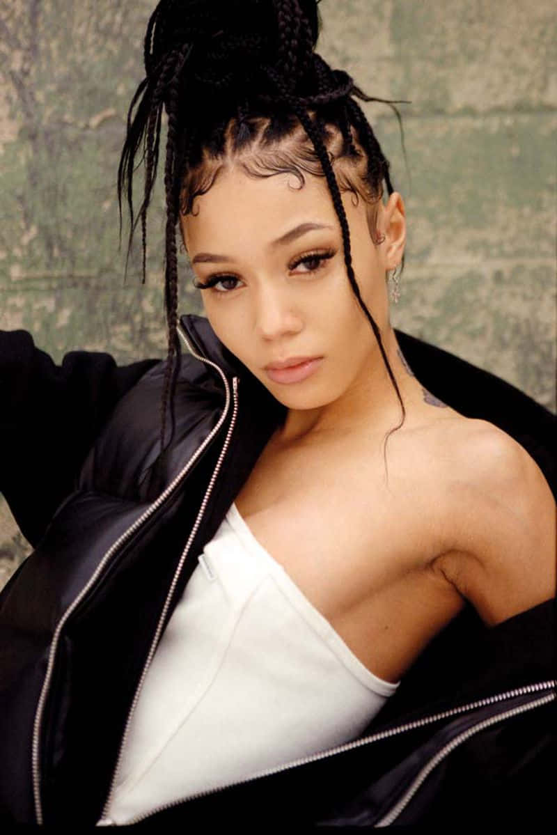 Coi Leray Adds Sass And Attitude To The Rap Game Background
