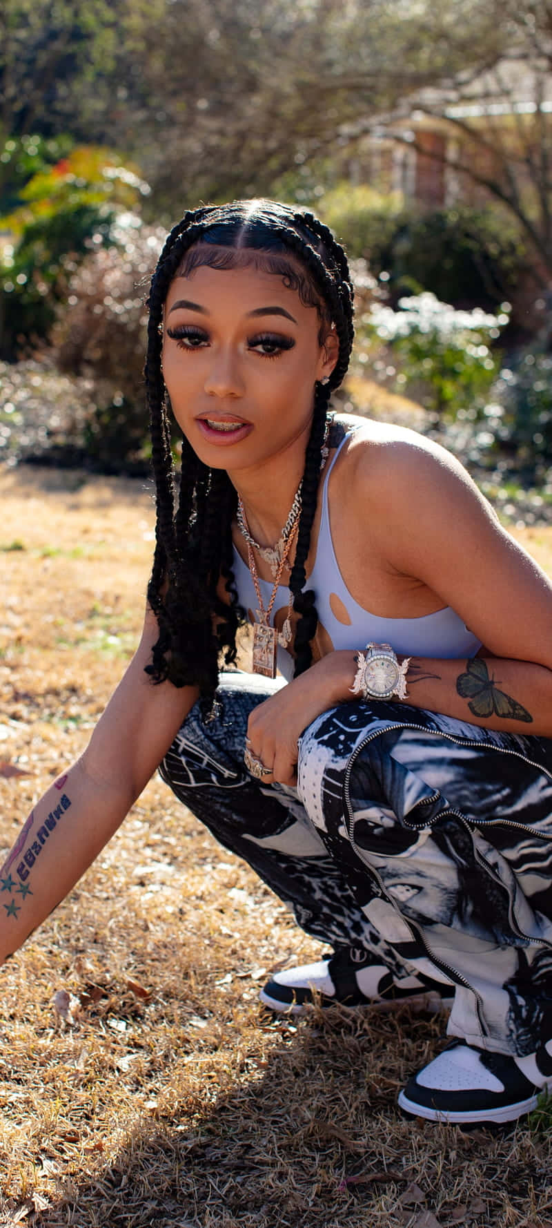 Coi Leray Brings Beauty And Bravado To The Stage. Background