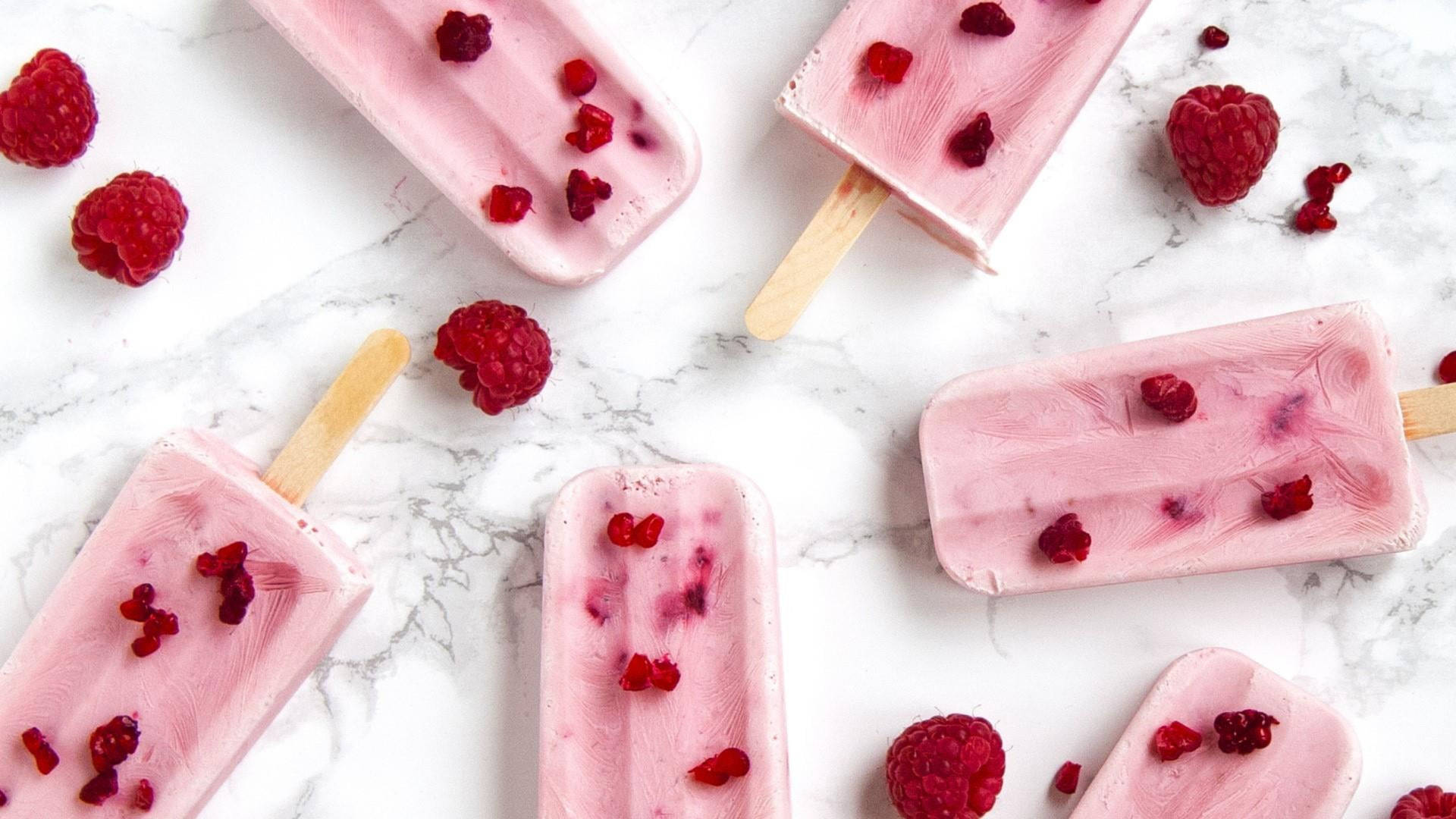 Cold Raspberry Popsicles Background