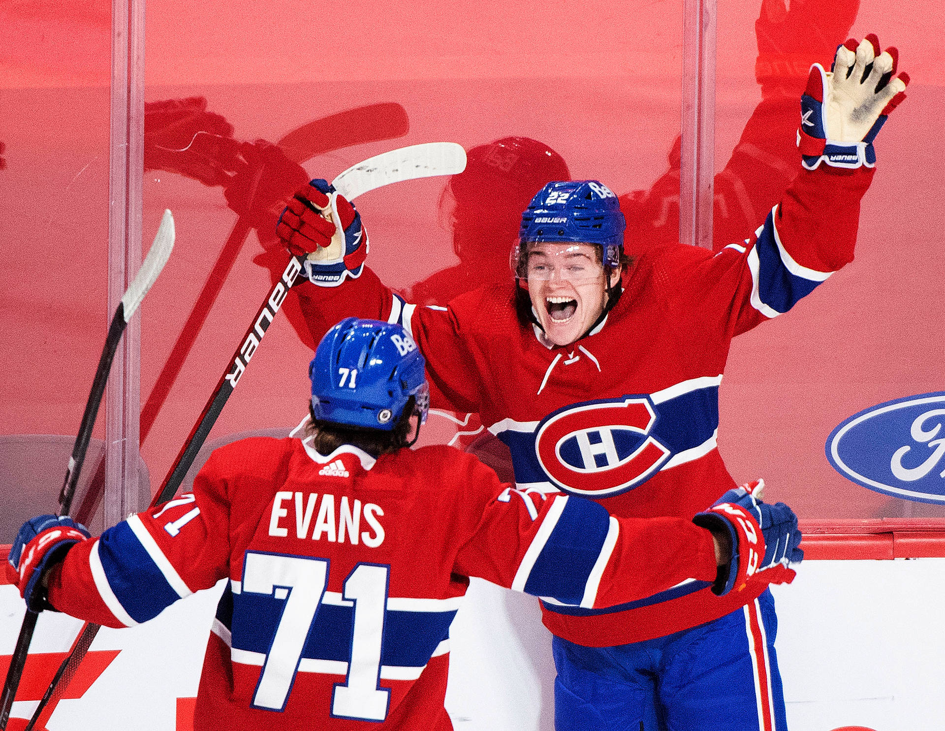 Cole Caufield Jake Evans Celebrate Goal