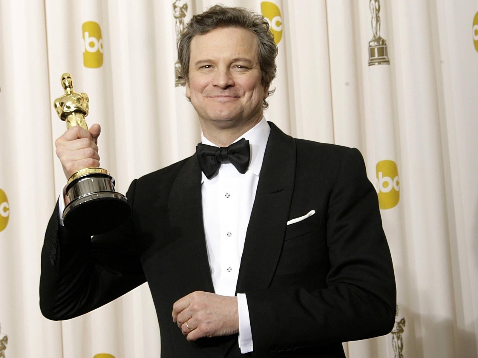 Colin Firth At The 83rd Annual Oscar Awards Background