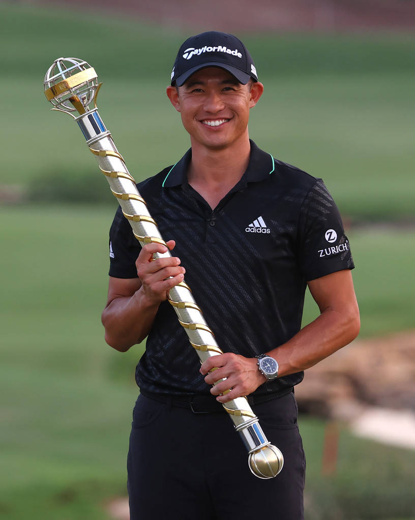 Collin Morikawa Holding A Staff Award