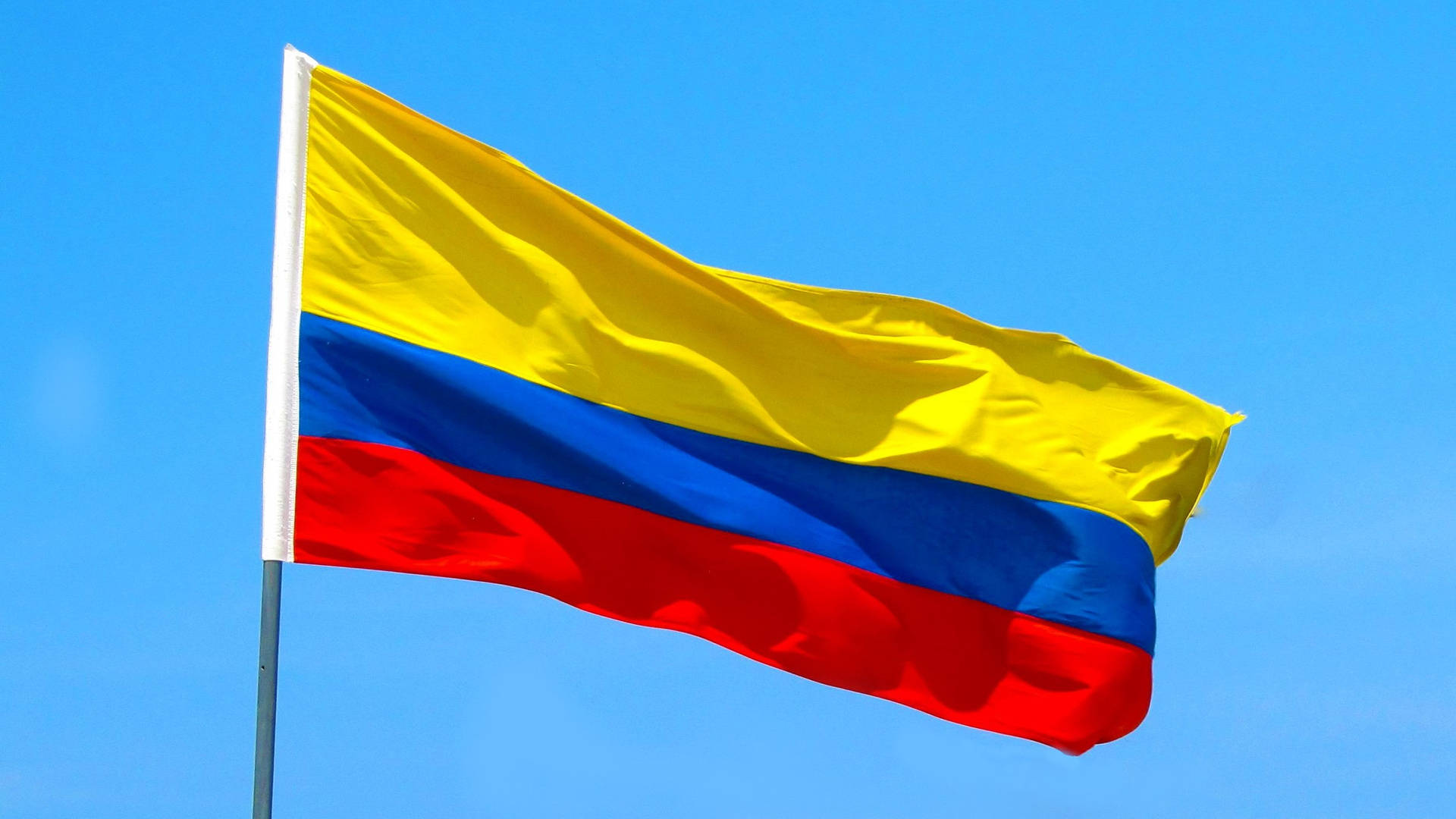 Colombia Flag In The Air Background