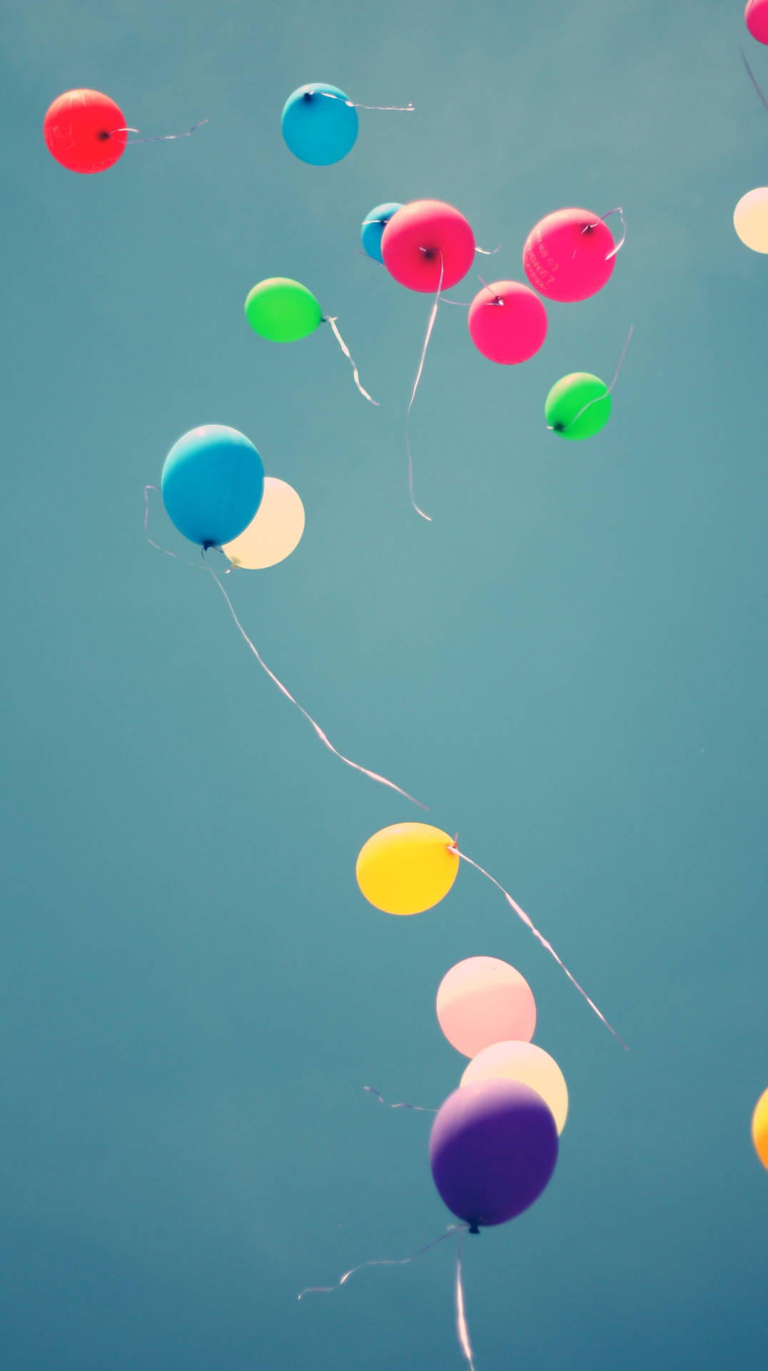 Colorful Balloons At Dark Blue Sky Background