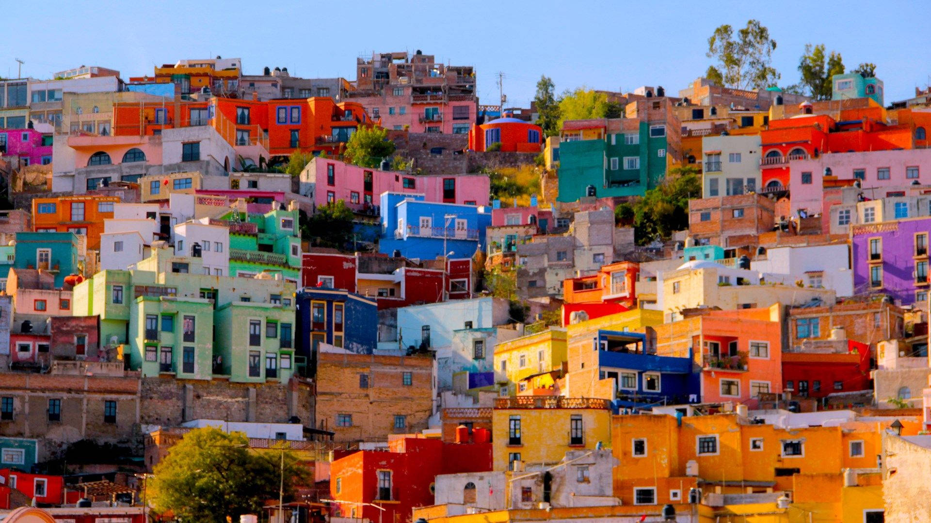 Colorful Chicano Houses In Mexico Background