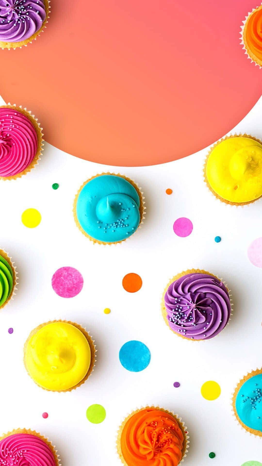 Colorful Cupcakes On A White Background