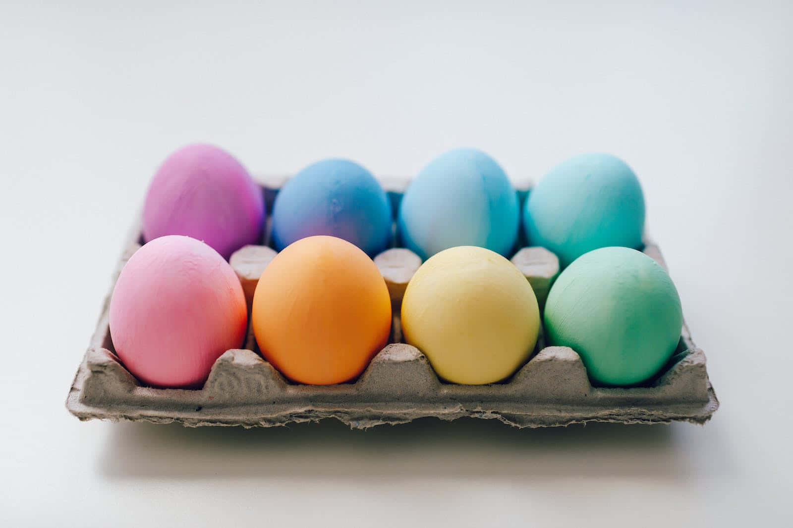 Colorful Easter Eggs In A Cardboard Box