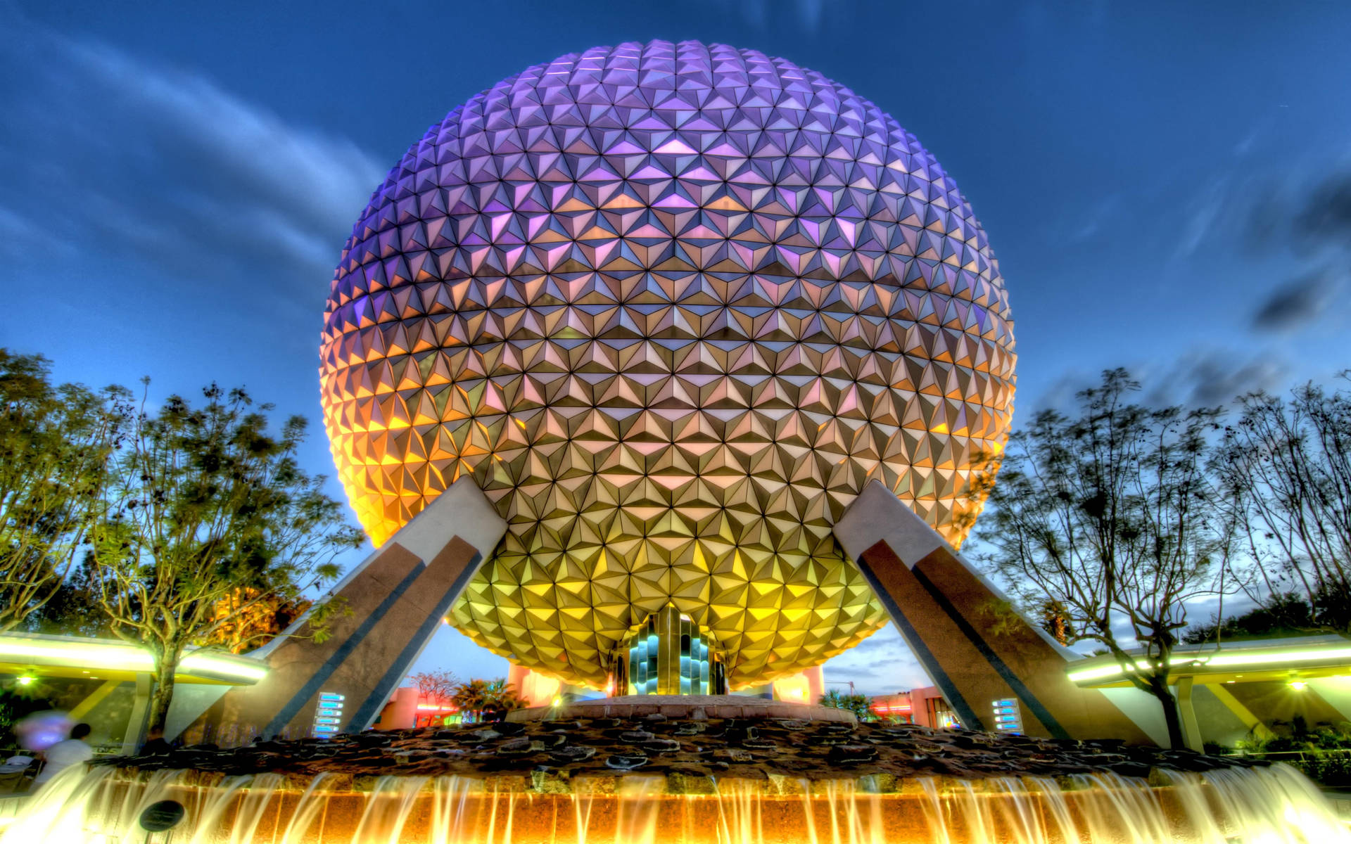 Colorful Epcot Globe In The Evening Background