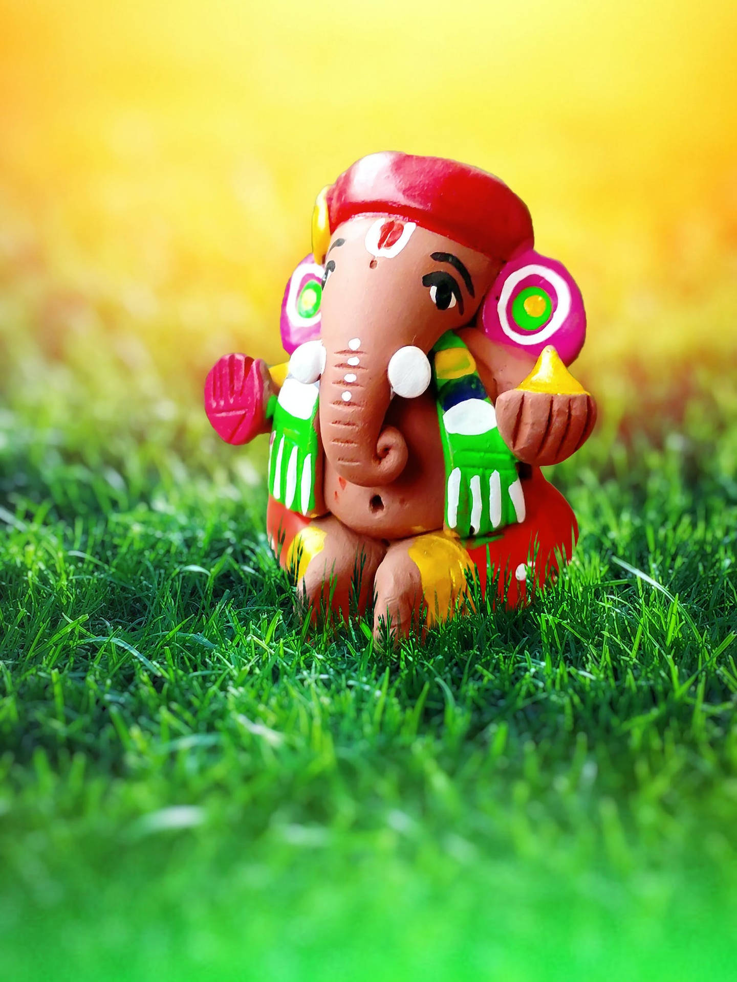 Colorful Ganesha Small Figurine Background