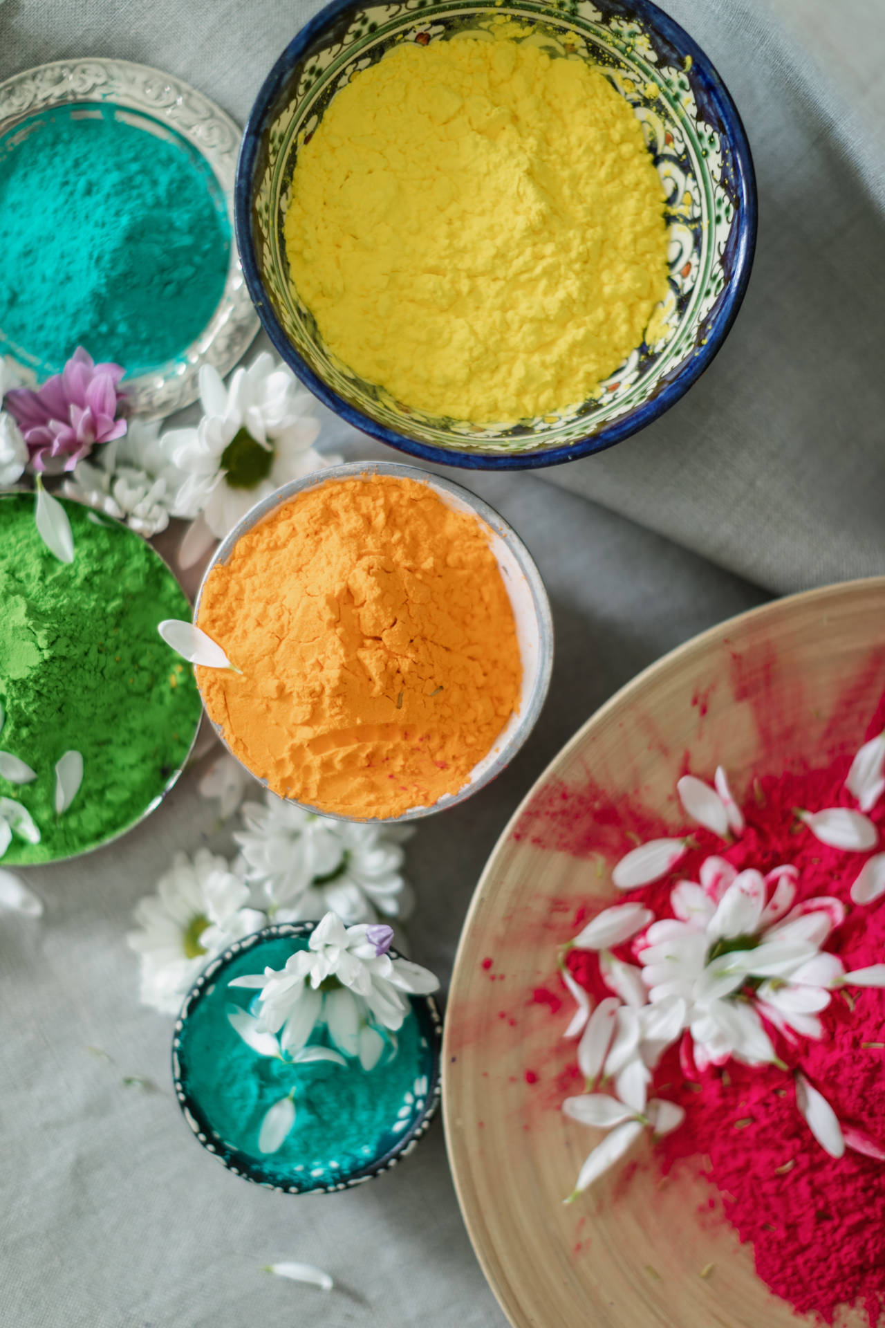 Colorful Holi Celebration With Hd Flowers And Powders Background