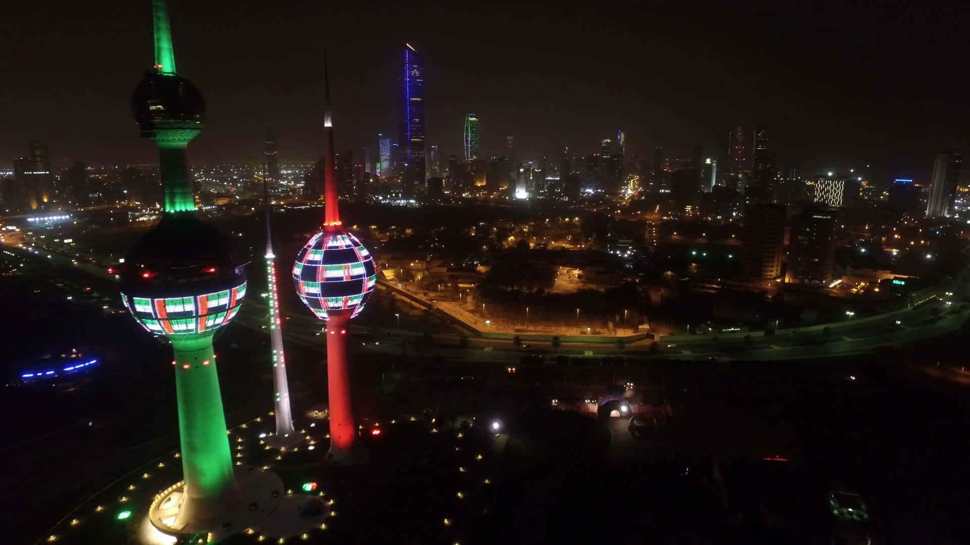 Colorful Lights Kuwait Towers At Night Background