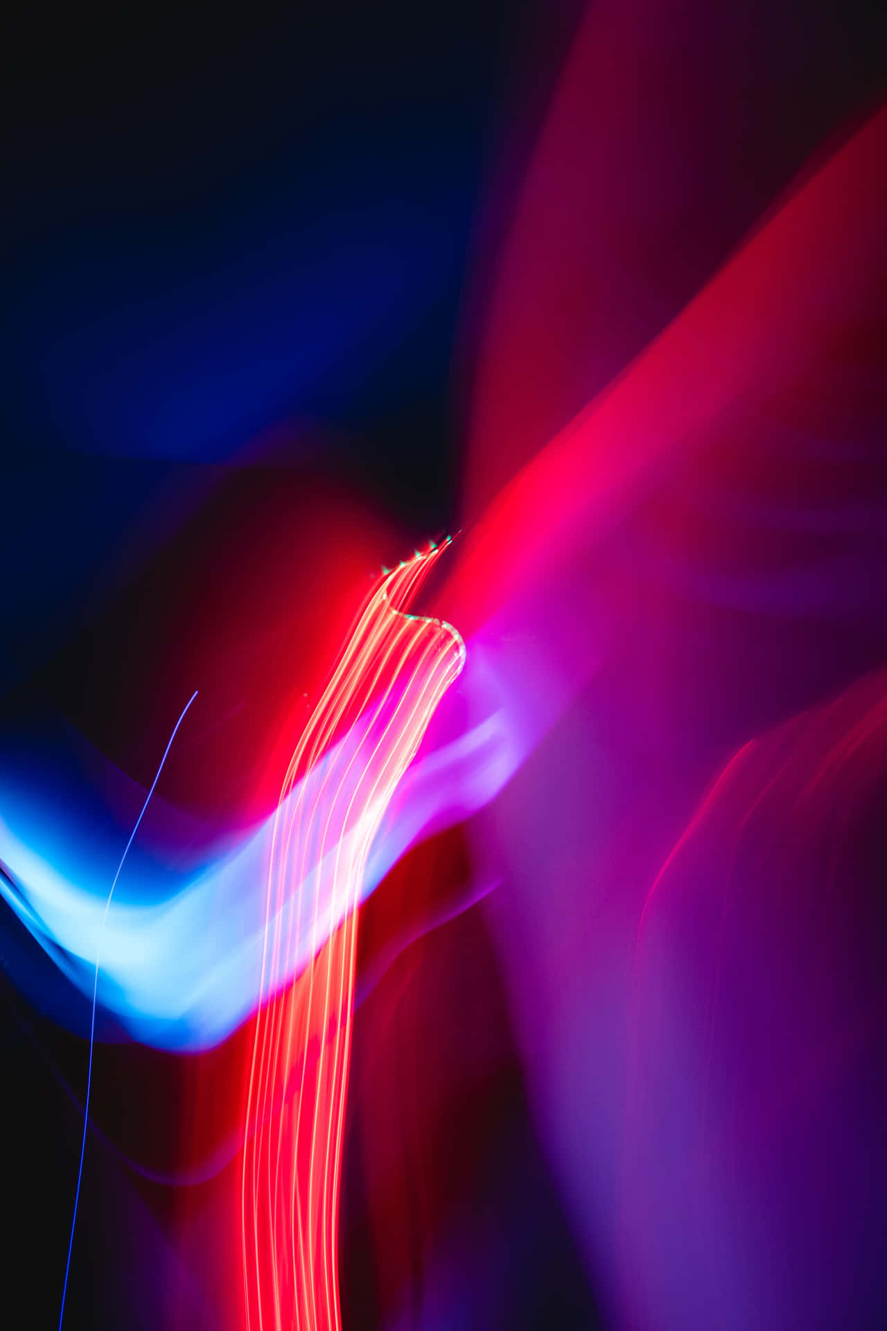 Colorful Neon Pink And Blue Lights Brightening Up The Night Background