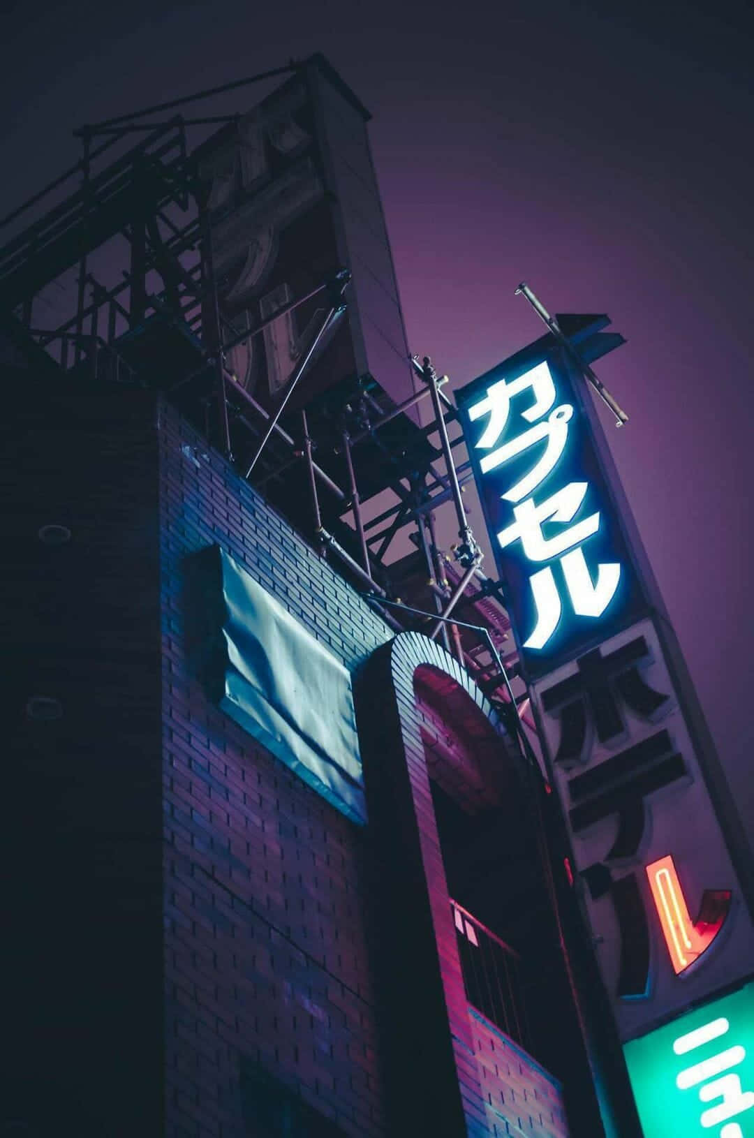 Colorful Neon Signs Light Up The Nightscape In Japan Background