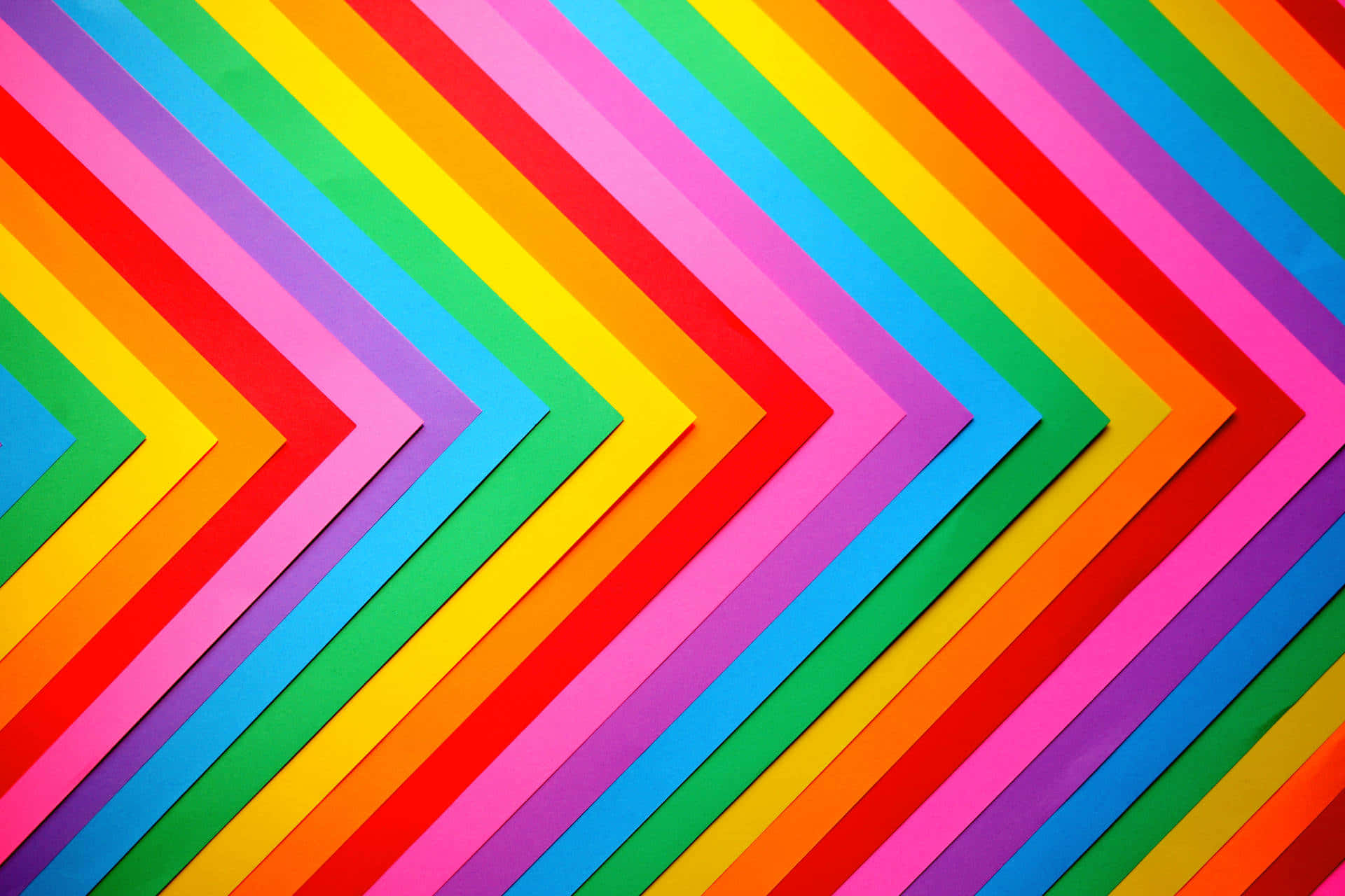 Colorful Paper Background With A Rainbow Arrow Background