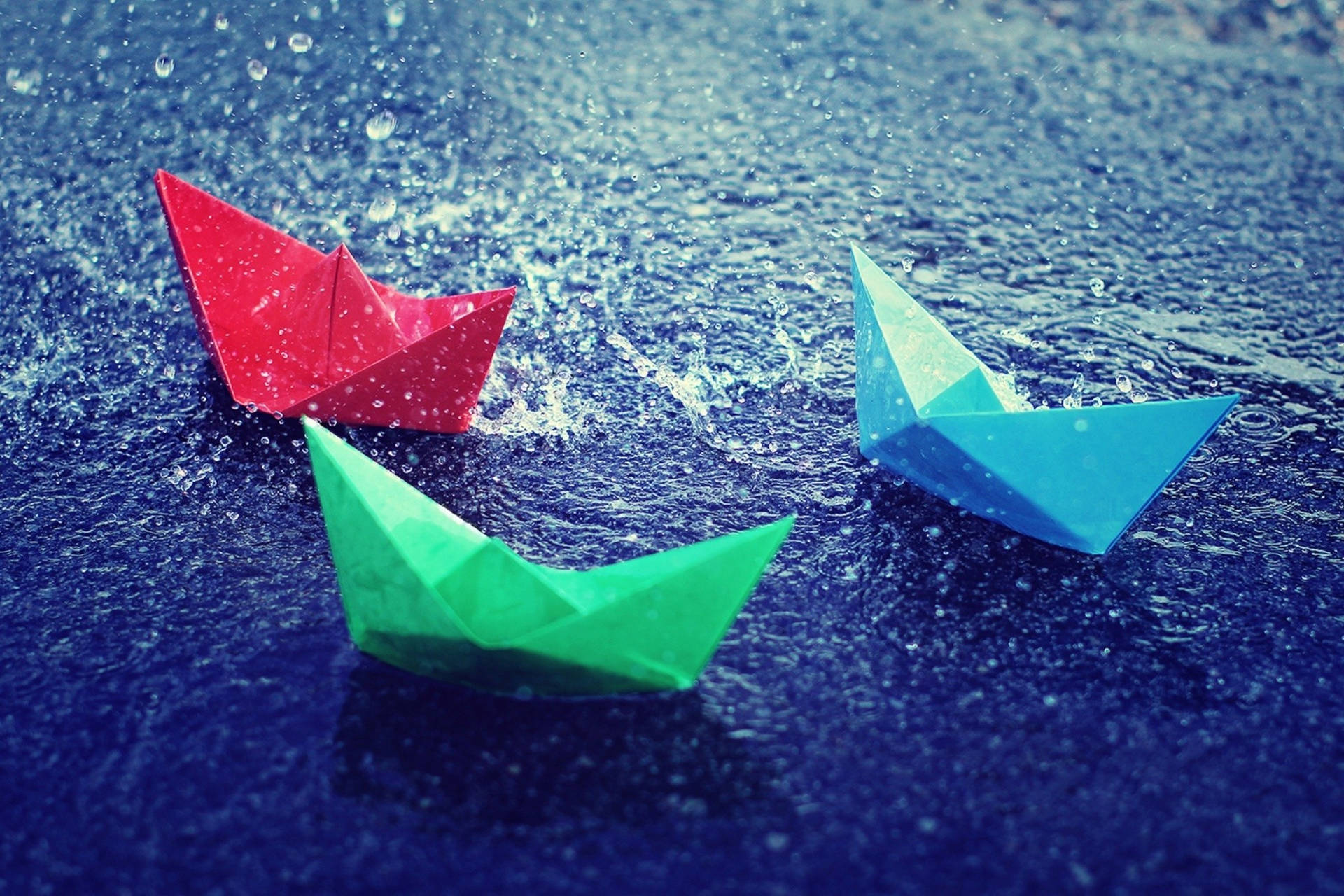 Colorful Paper Boats In The Rain Background