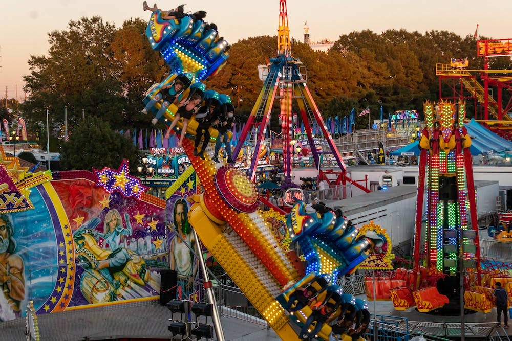 Colorful Rides At The Fair Background