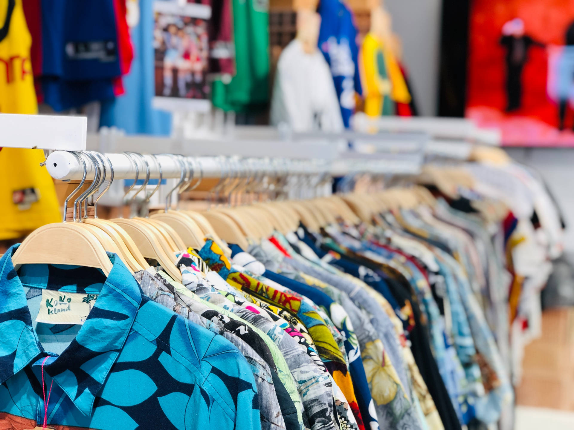 Colorful Shirts In Clothing Store Background