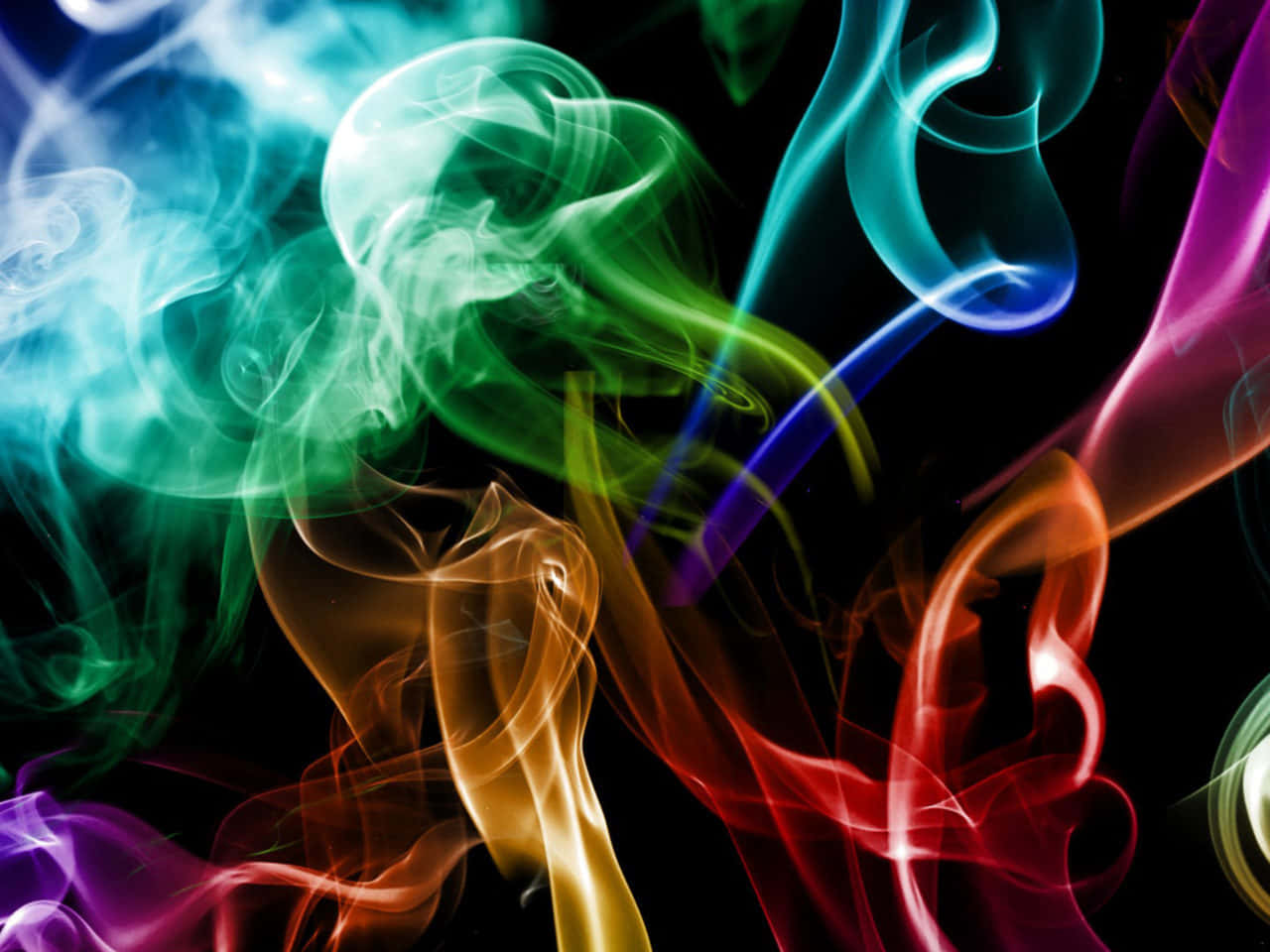 Colorful Smoke On A Black Background Background