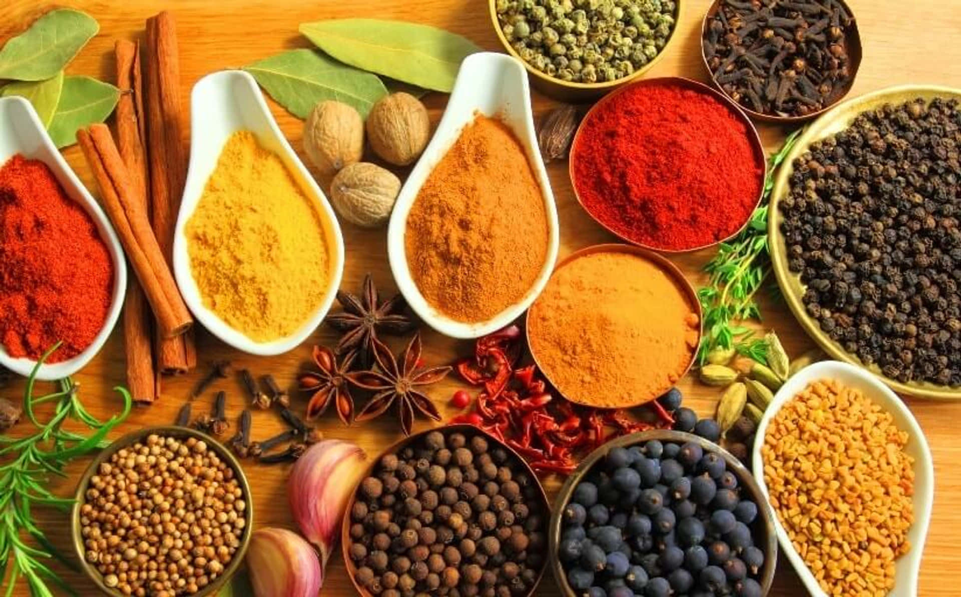 Colorful Spices On Wooden Surface Background