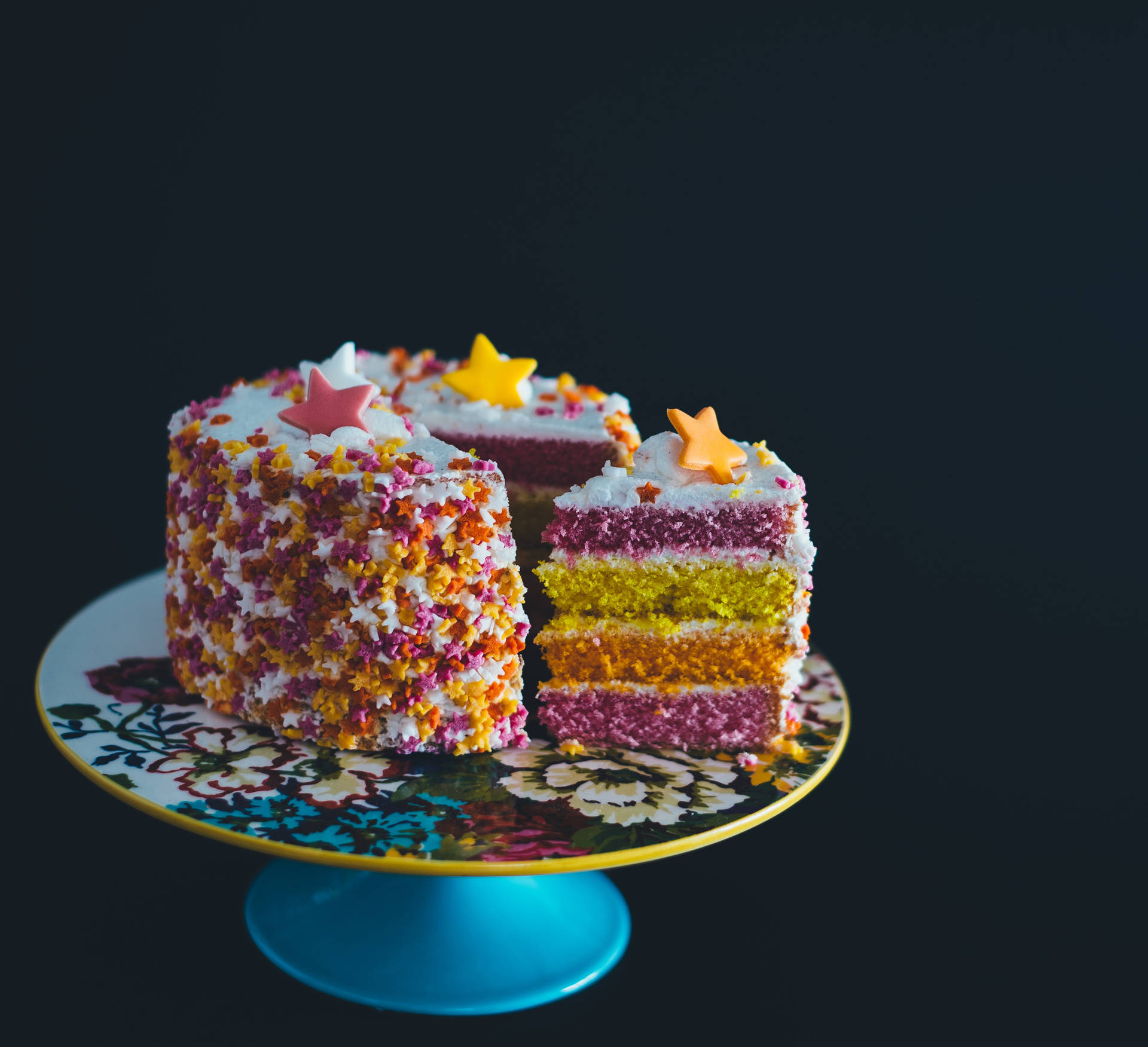 Colorful Star Sprinkled Birthday Cake Background