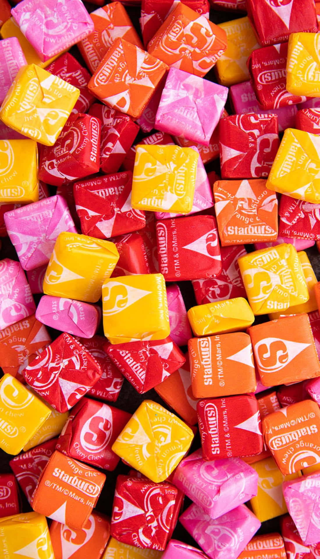 Colorful Starburst Candy Collection Background