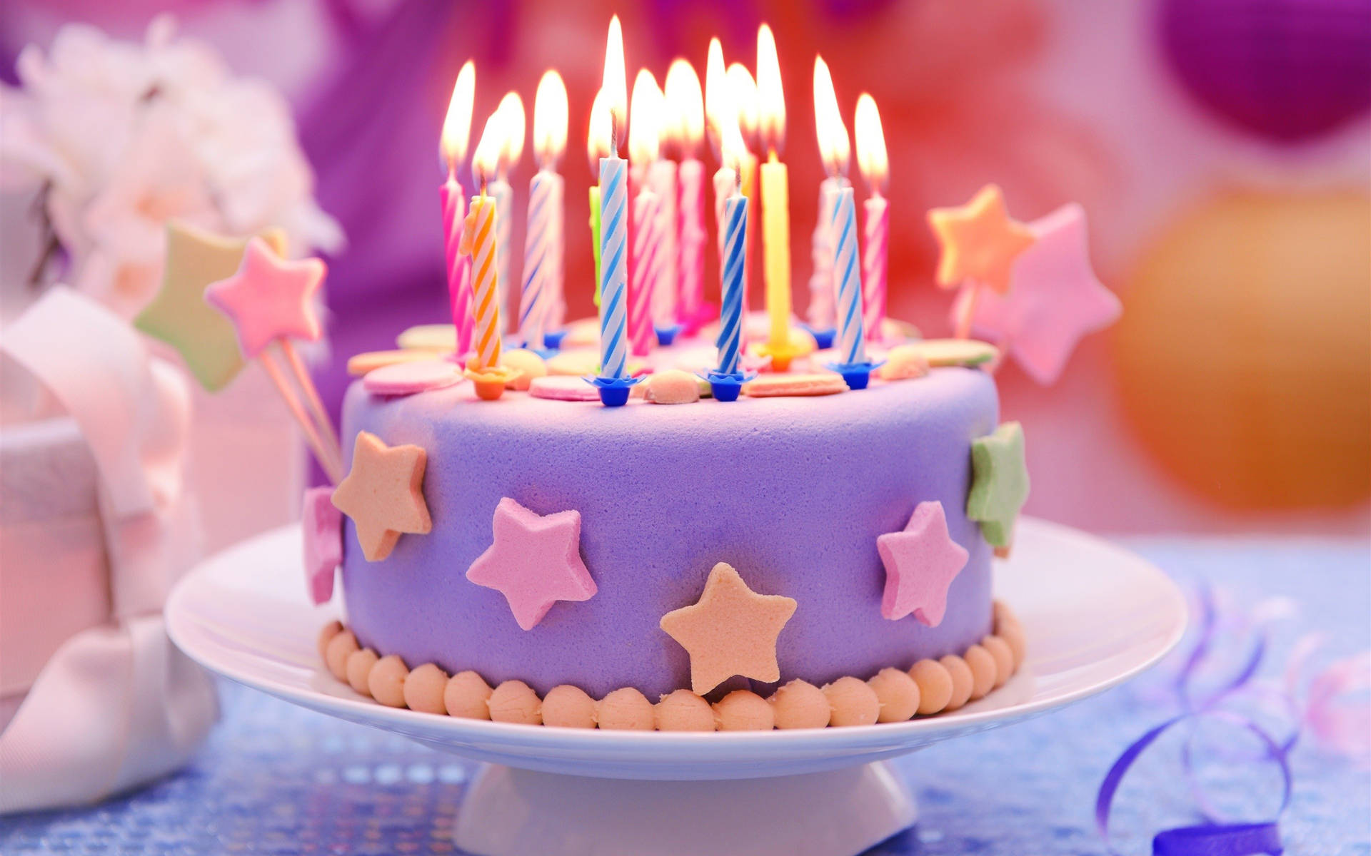 Colorful Stars Birthday Cake Candles Background