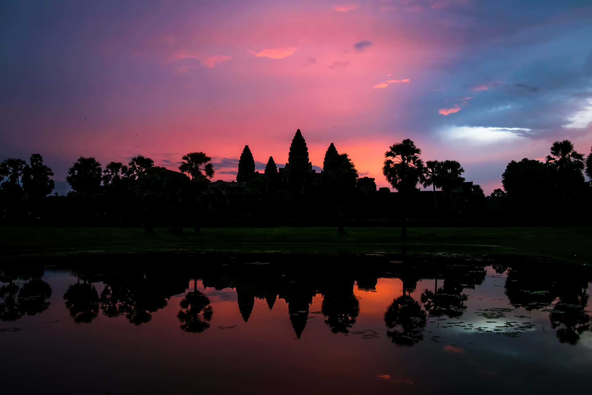 Colorful Sunset Over Angkor Thom Background