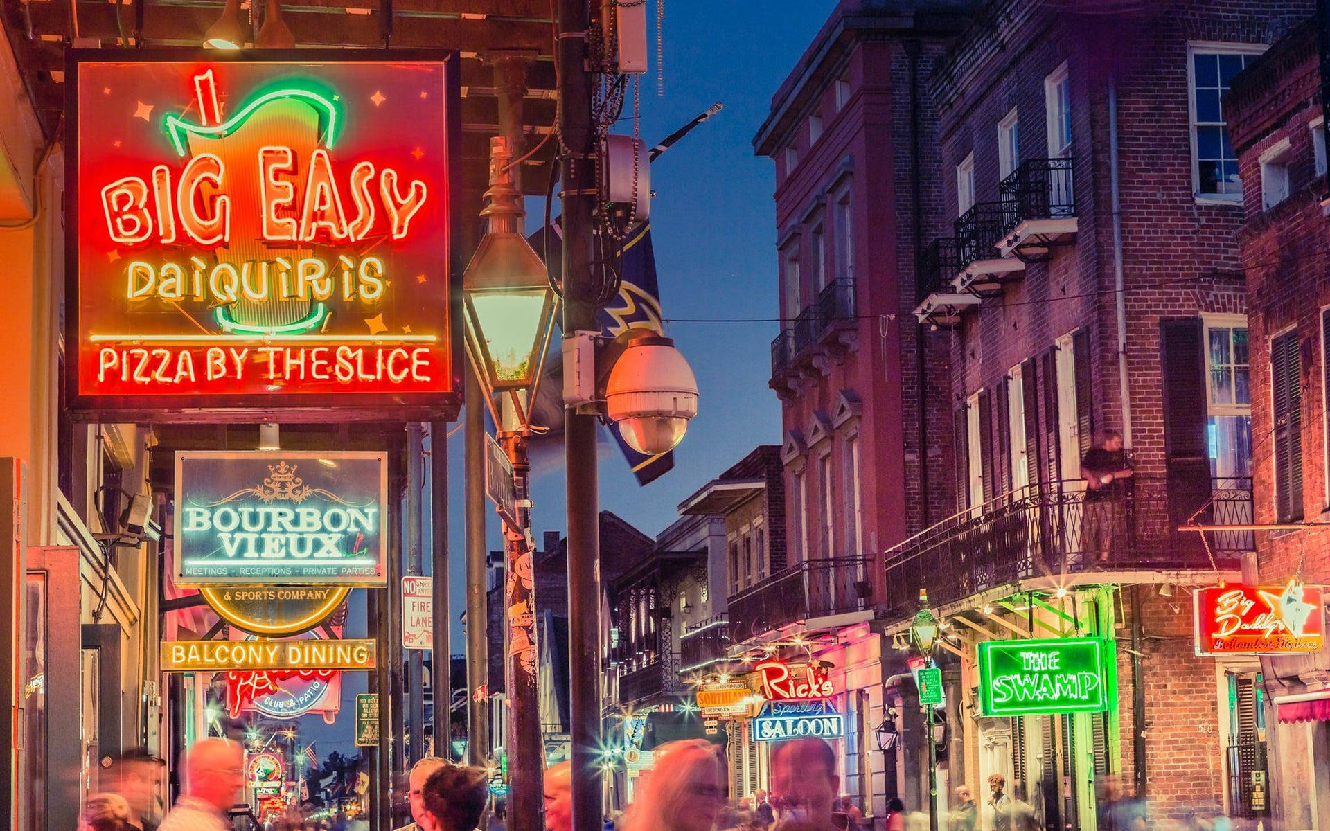 Colorful Vibrancy Of French Quarter At Night Background