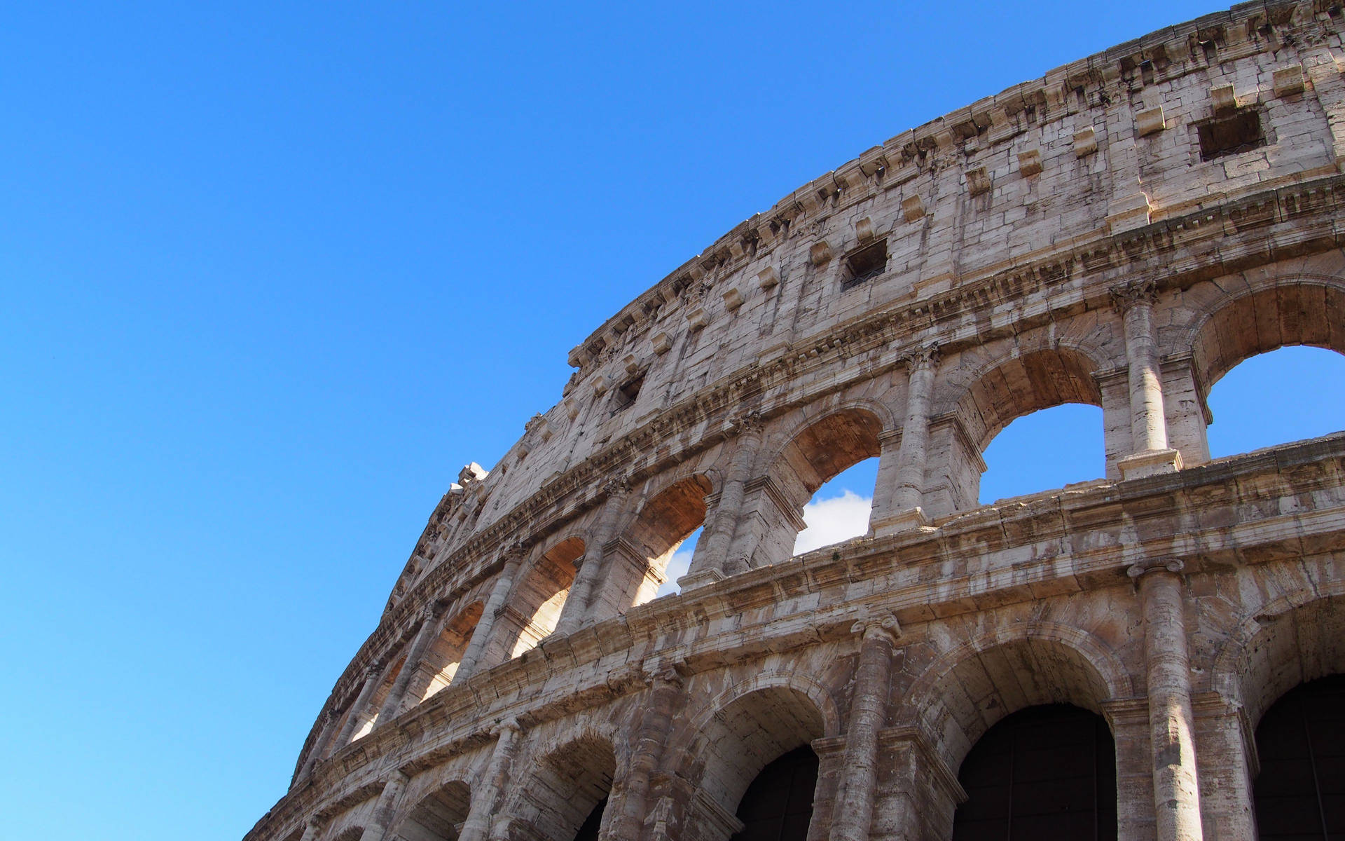 Colosseum Facing The Clear Blue Sky Desktop Background