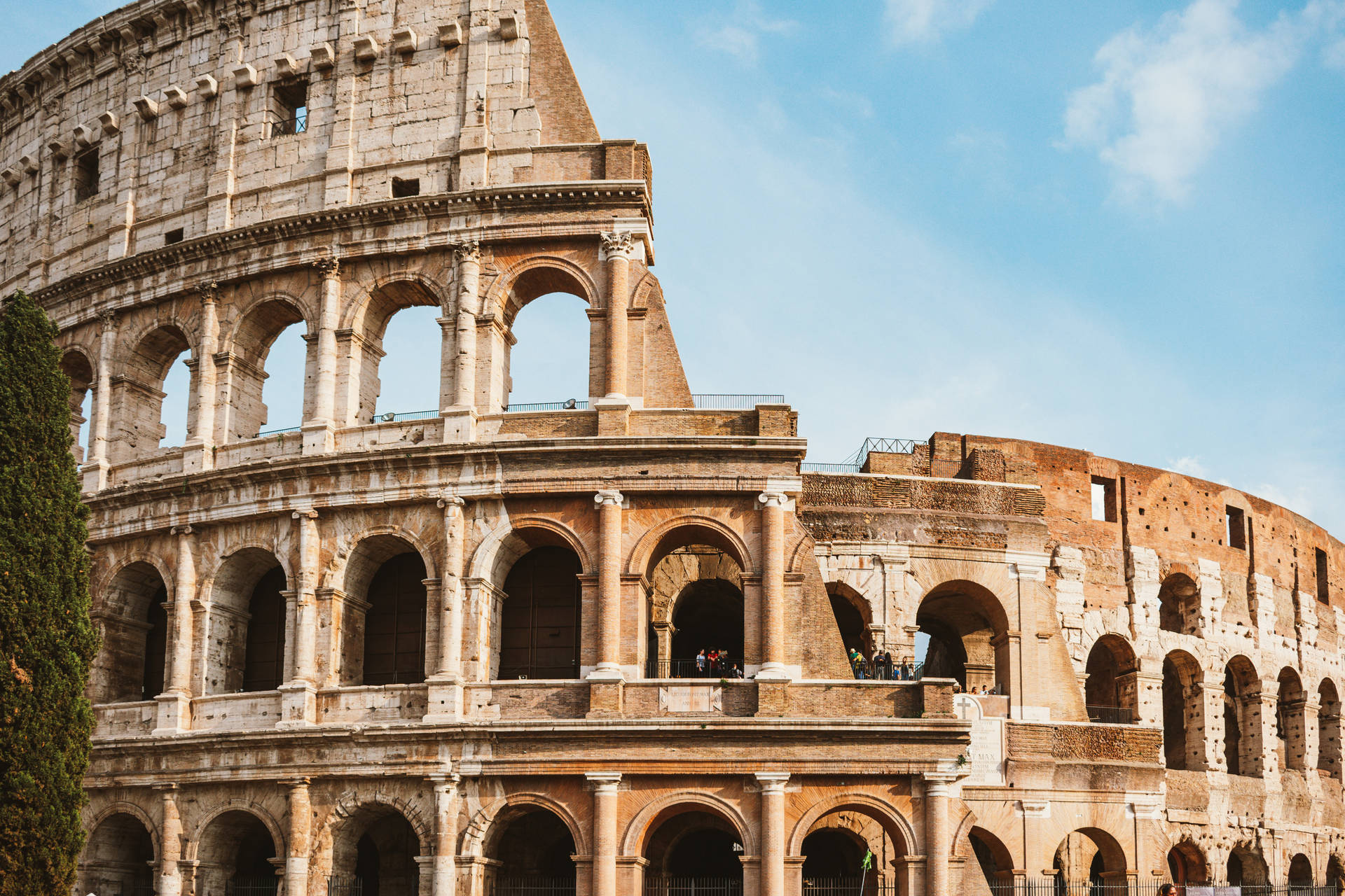 Colosseum Ruins In Front Of A Cloudy Sky Background