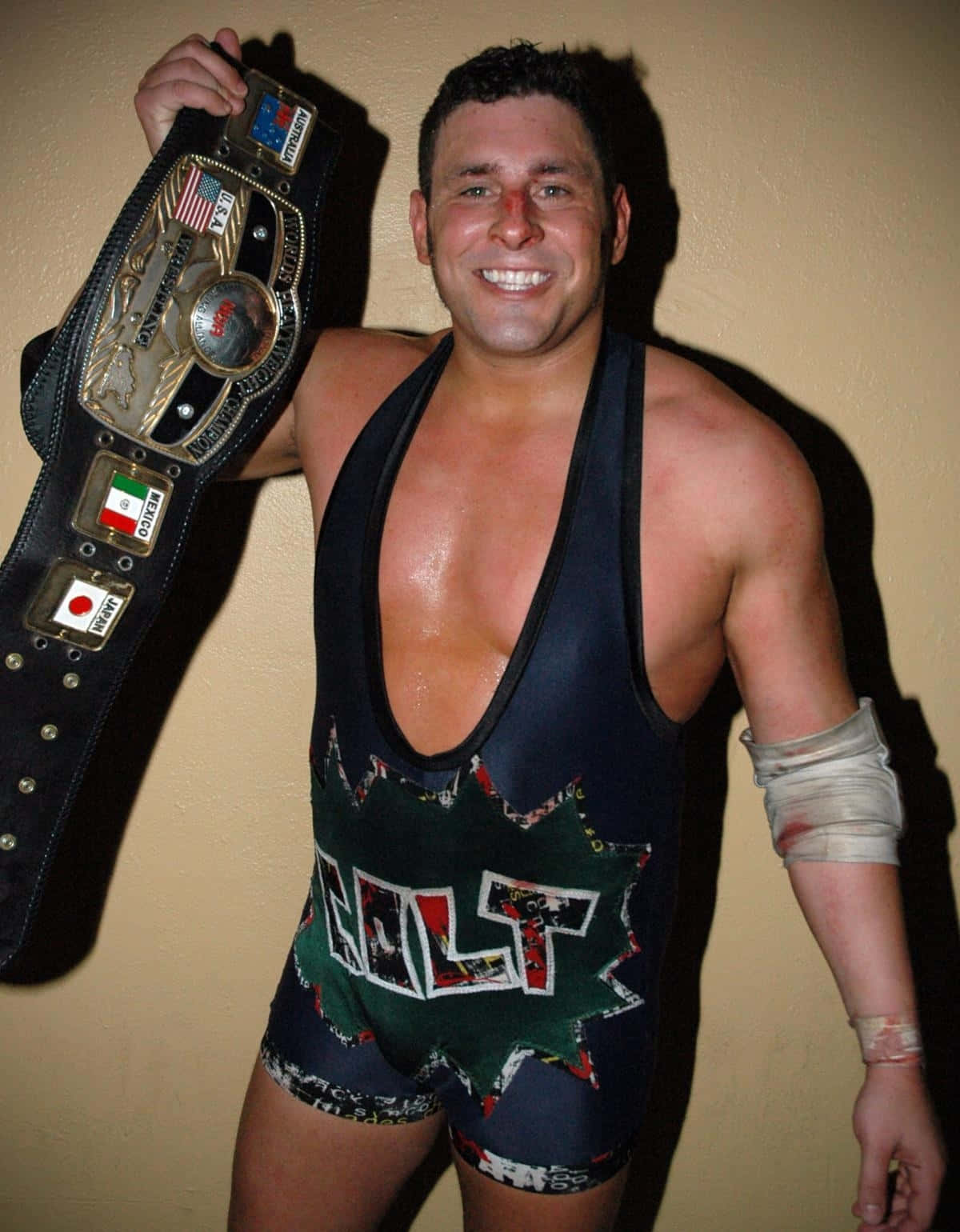 Colt Cabana Holding Nwa Domed Globe Championship Belt Background