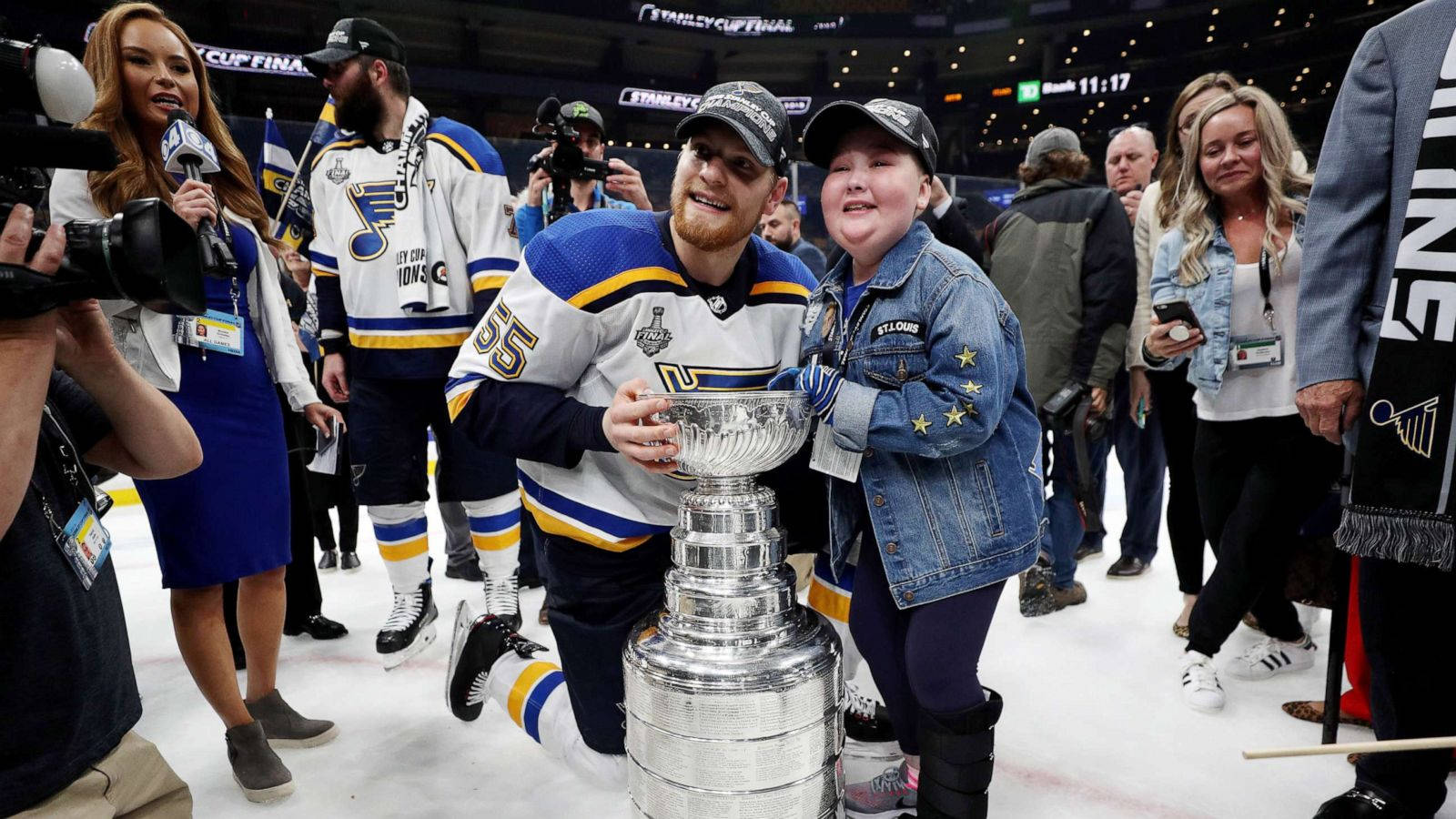 Colton Parayko Proudly Holding Championship Trophy Background