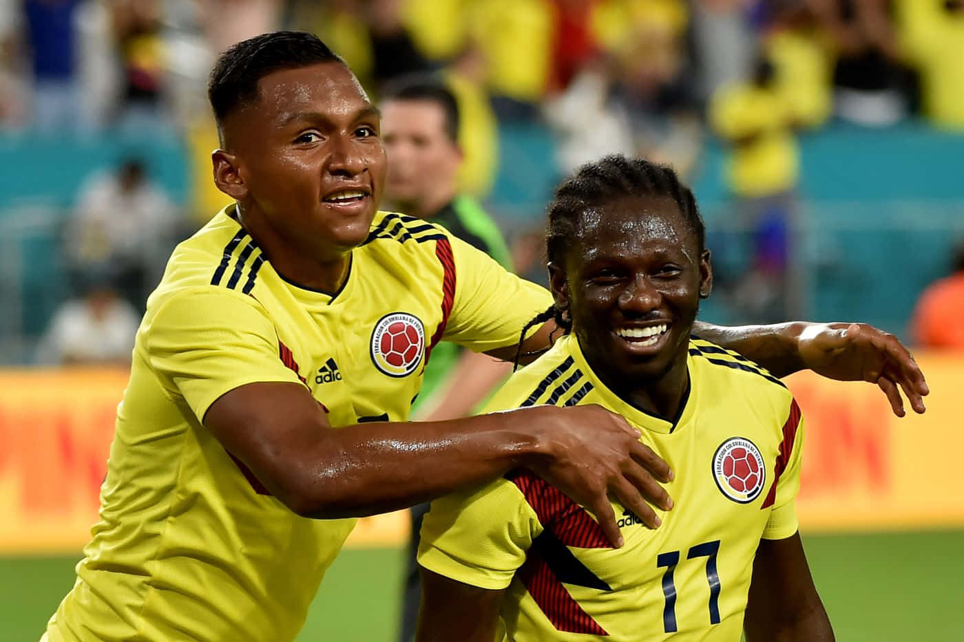 Columbian Football Players Alfredo Morelos And Yimmi Chara Medium Shot Background