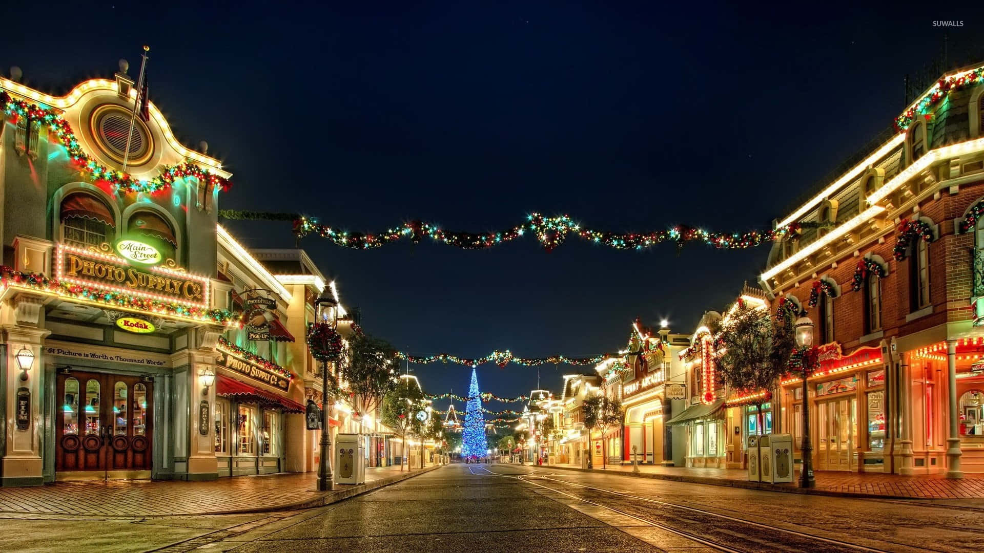 “come Explore And Experience Christmas At A Village You Won't Forget” Background