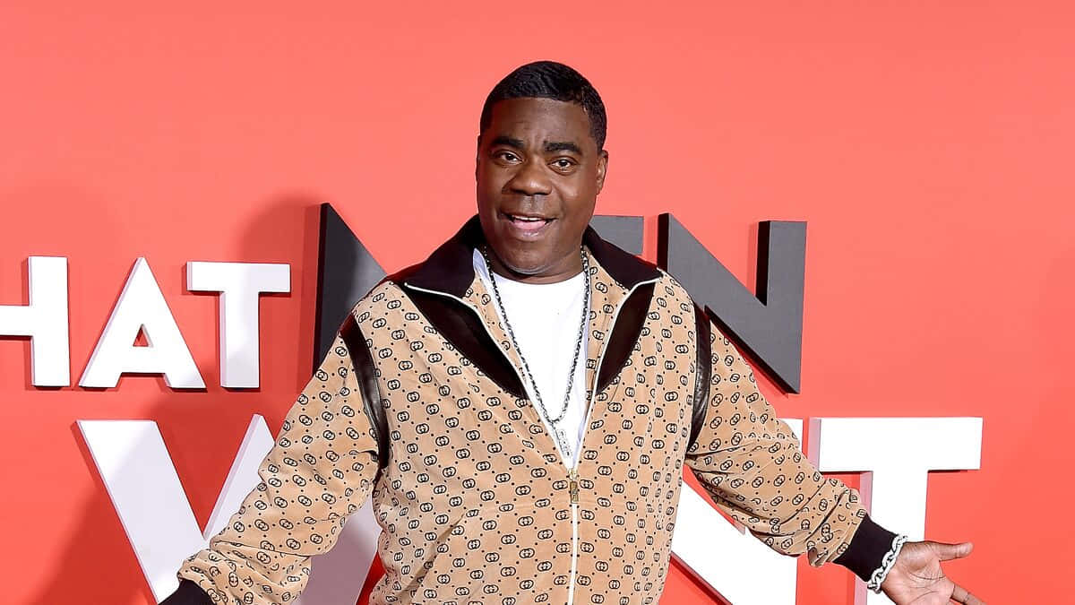 Comedian And Actor Tracy Morgan Smiling At An Event Background